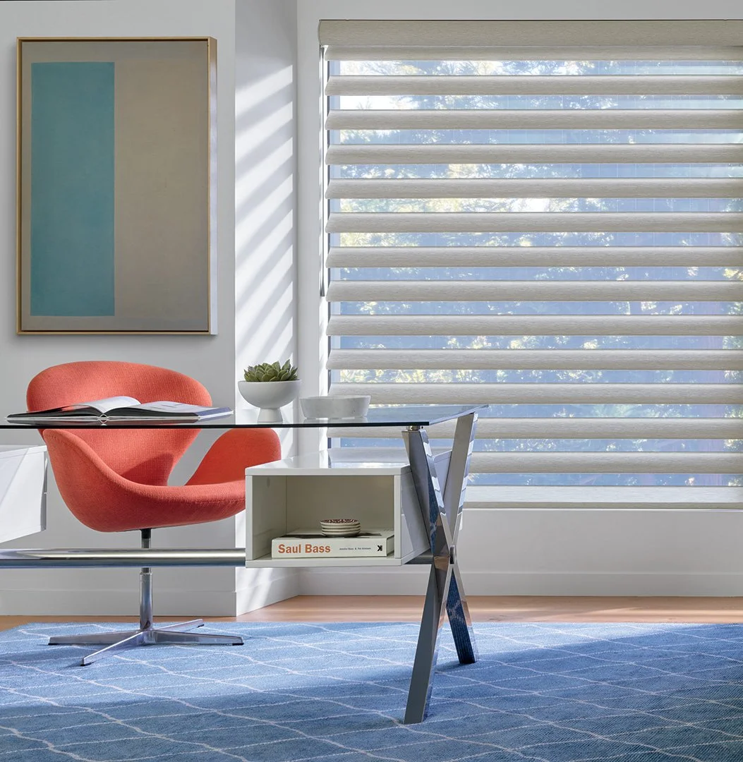 Close-up styling detail for Hunter Douglas showcasing luxury custom window treatments with curated home office furniture and accessories, styled by Stephen Pappas Interiors