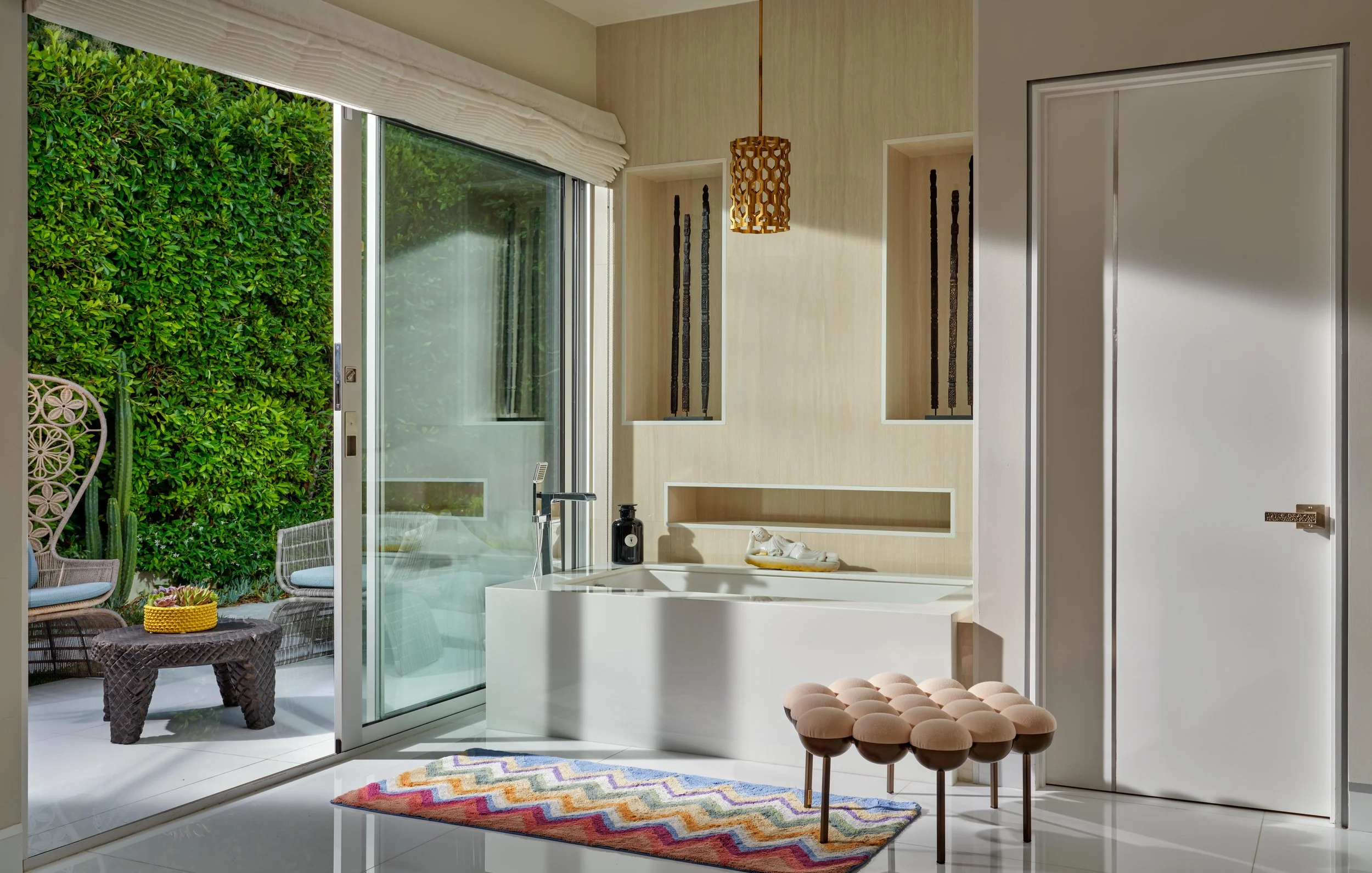 Bathroom detailof Trousdale Estates area, Beverly Hills luxury home featuring a deep white but, modern plush seating near a sliding glass door, full-service interior design by Stephen Pappas Interiors, Los Angeles