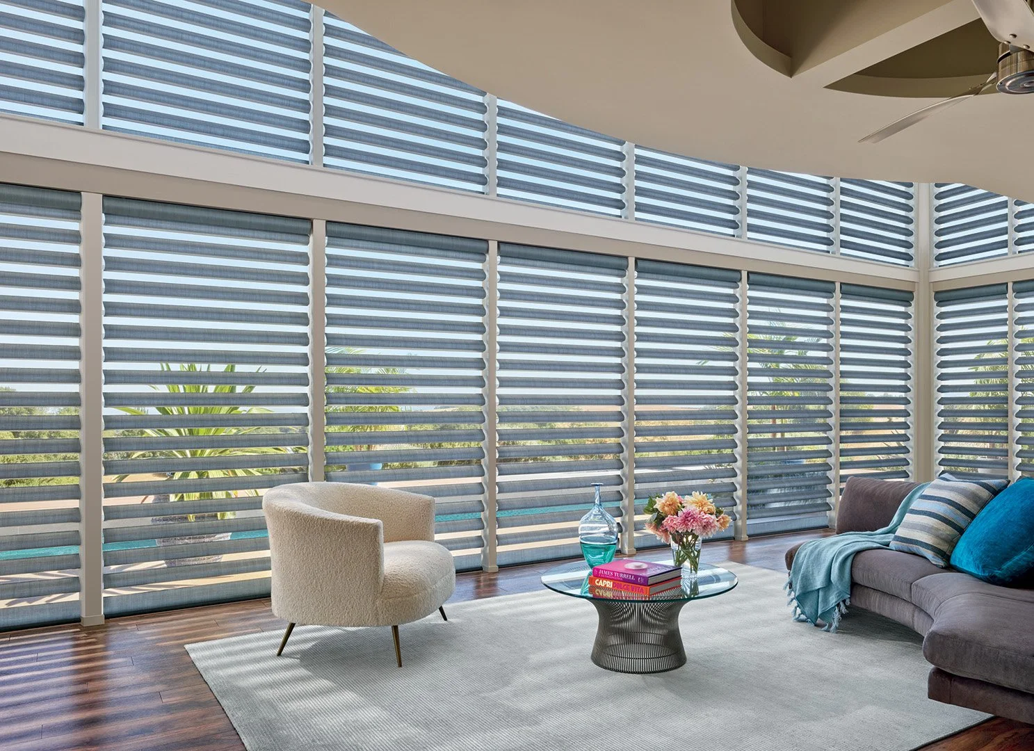 Interior styling for Hunter Douglas featuring luxury custom blinds in modern living room with curated furniture and large floor-to-ceiling windows, styled by Stephen Pappas Interiors