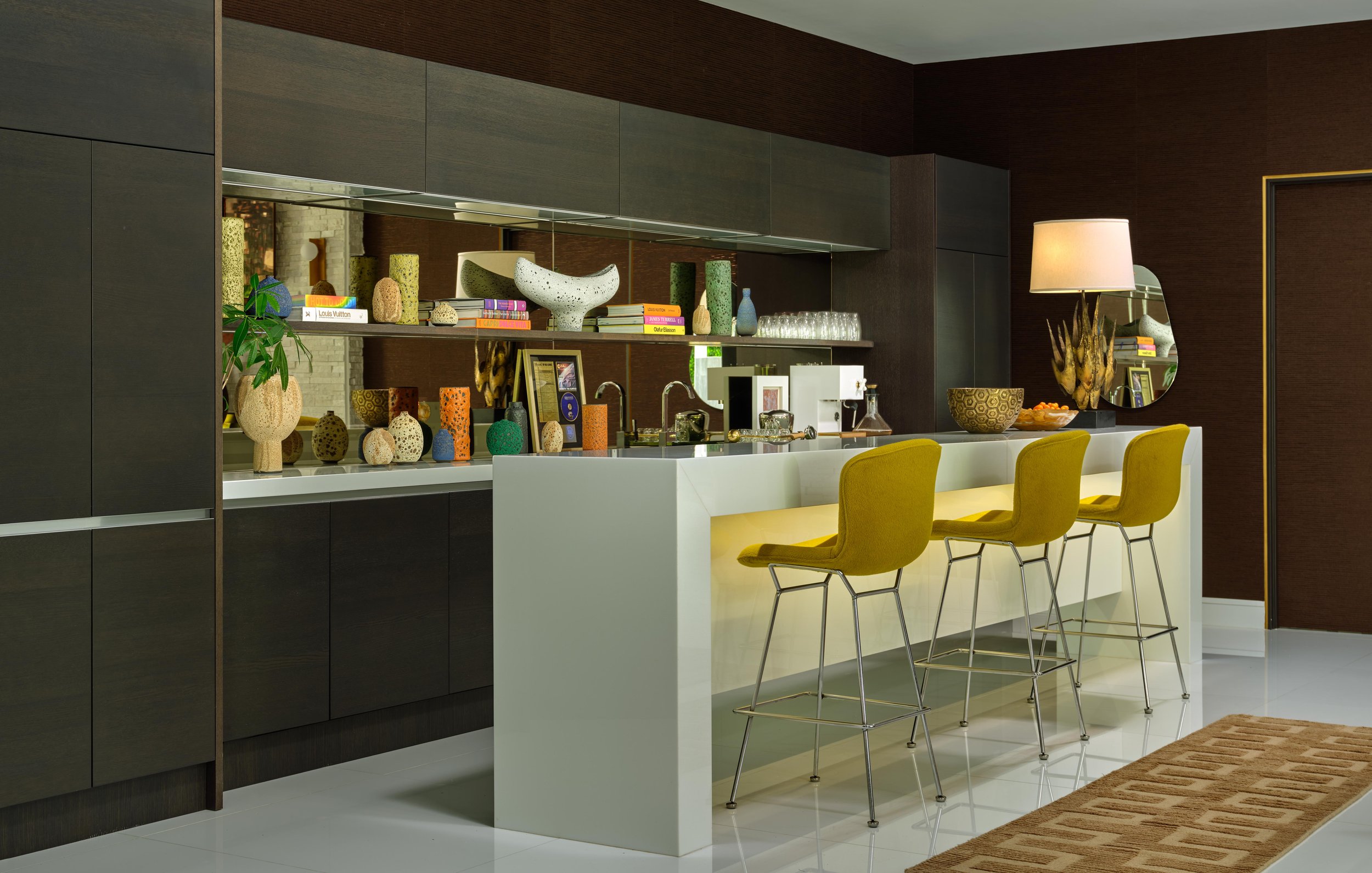 Custom bar of Trousdale Estates area, Beverly Hills luxury home featuring modern fixtures and seating, full-service interior design by Stephen Pappas Interiors, Los Angeles