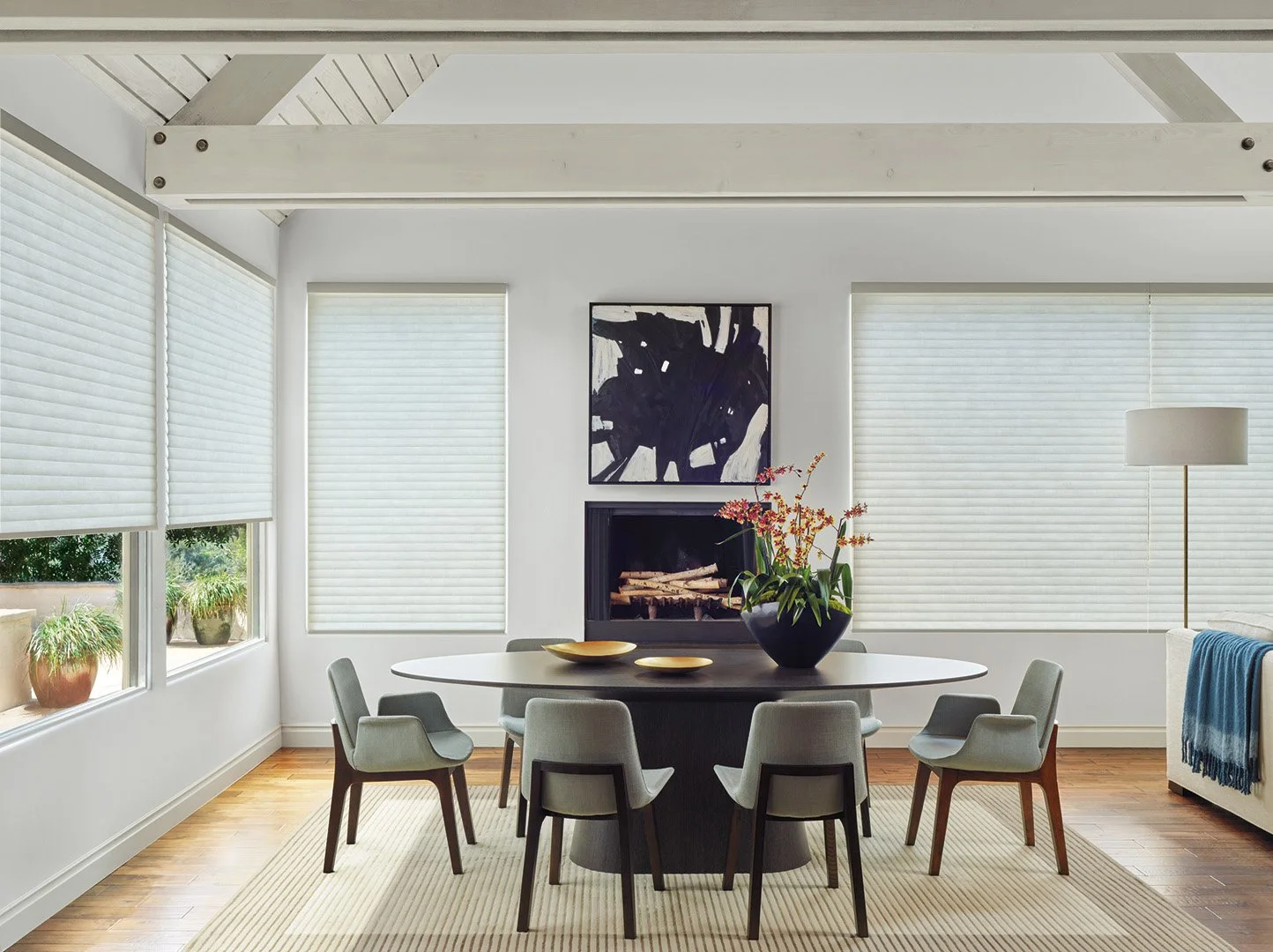 Interior styling for Hunter Douglas featuring made-to-measure window treatments in refined dining room with curated accessories, styled by Stephen Pappas Interiors