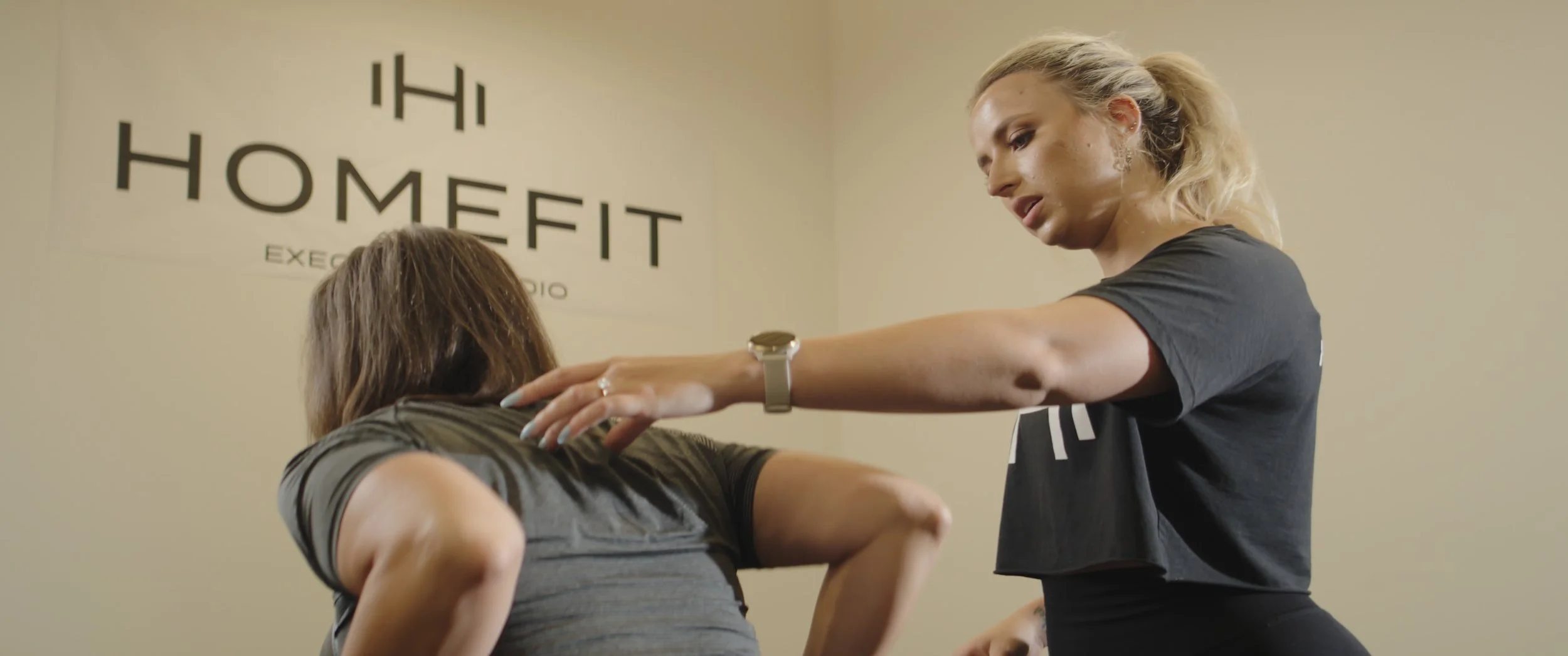 HOMEFIT personal trainer providing individualized strength and fitness coaching for a client in Austin, Texas.