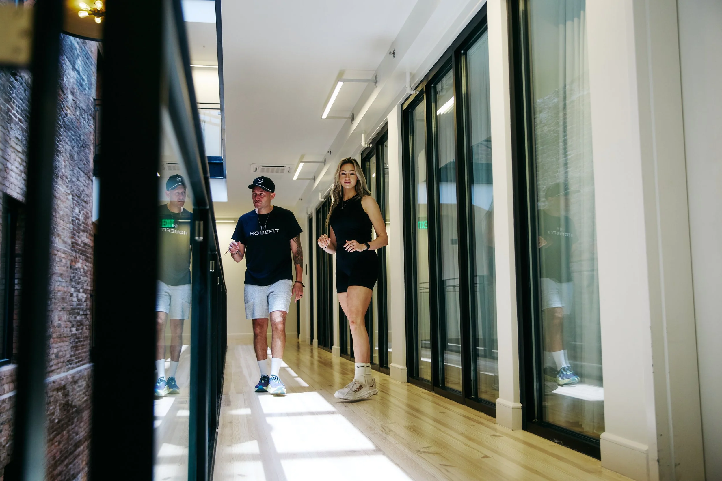 HOMEFIT personal trainer and client in Austin, Texas during a personalized in-home fitness and wellness session.