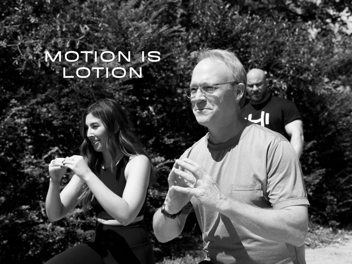 Older adult practices low-impact outdoor movement with HOMEFIT trainers to improve strength, balance, and confidence with arthritis.