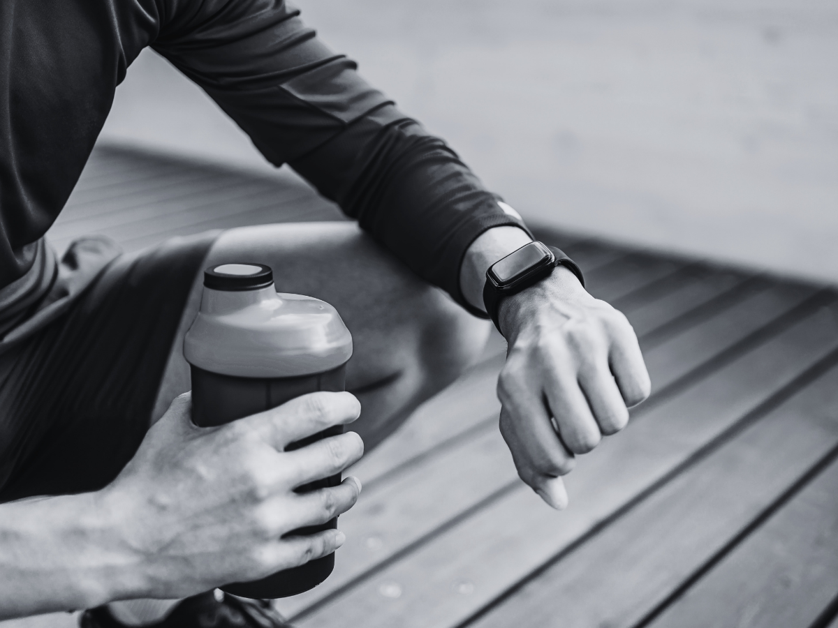 1. Fitness tracker and smartwatch used to monitor workout recovery, heart rate, activity, and wearable fitness data during a personalized exercise routine.