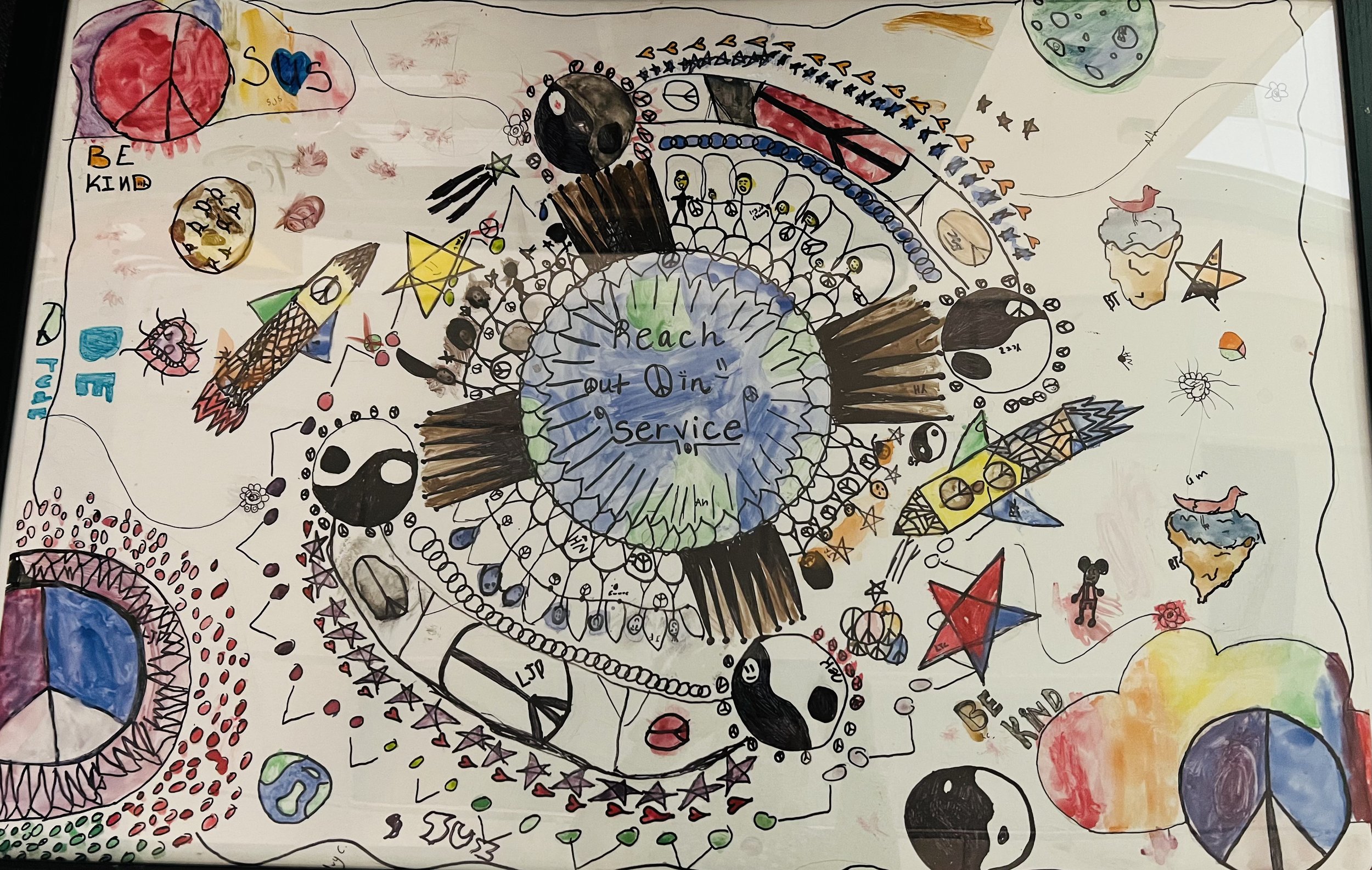 a colorful mandala made by students that Reach Out In Services