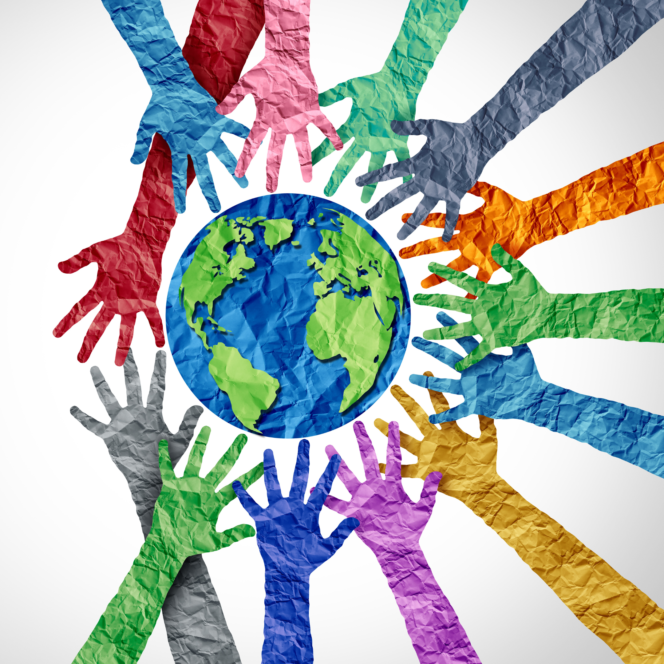 paper cut outs of colorful hands and forearms reaching to a paper blue and green earth