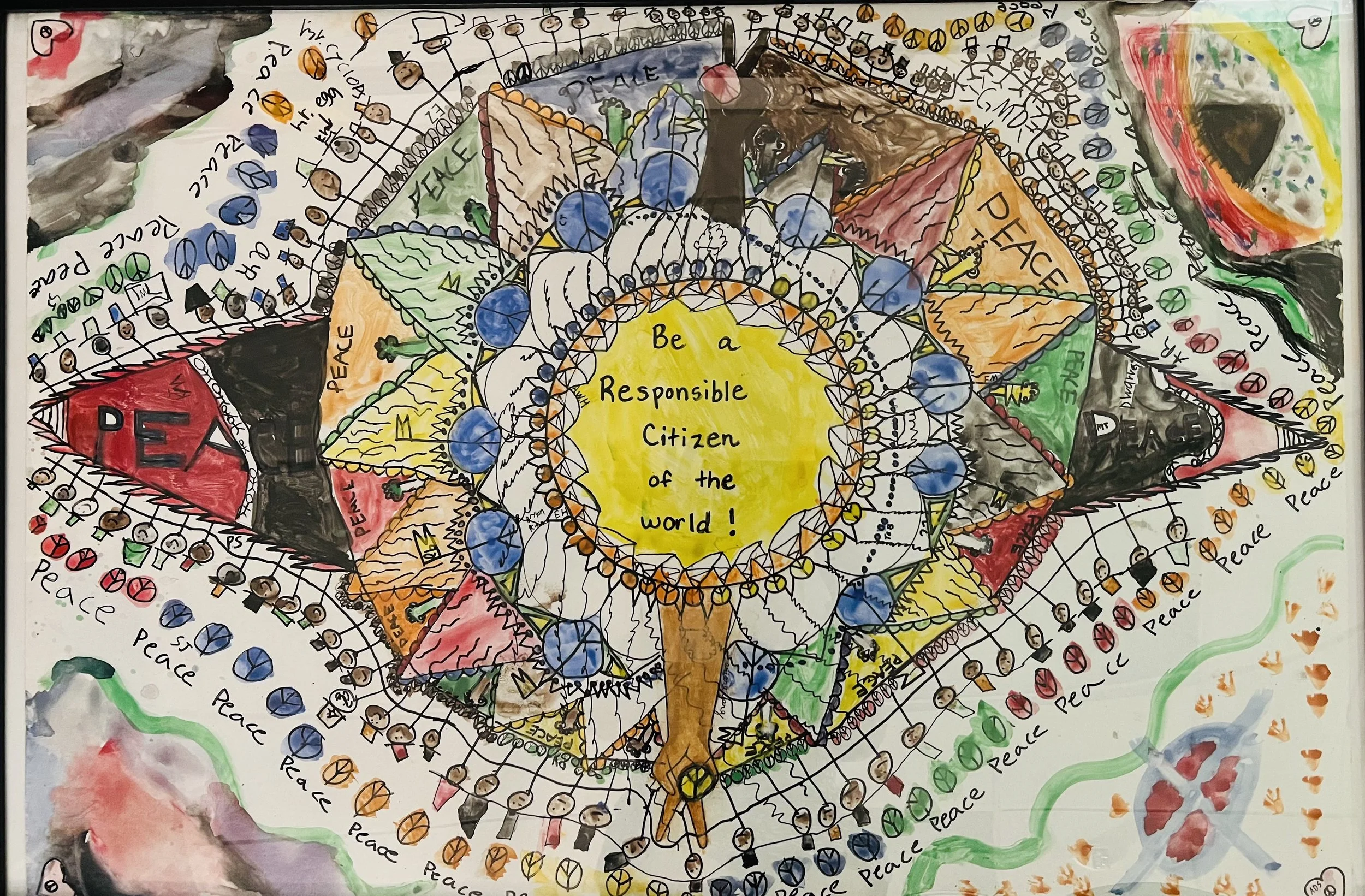 a student made colorful mandala that says be a responsible citizen of the world