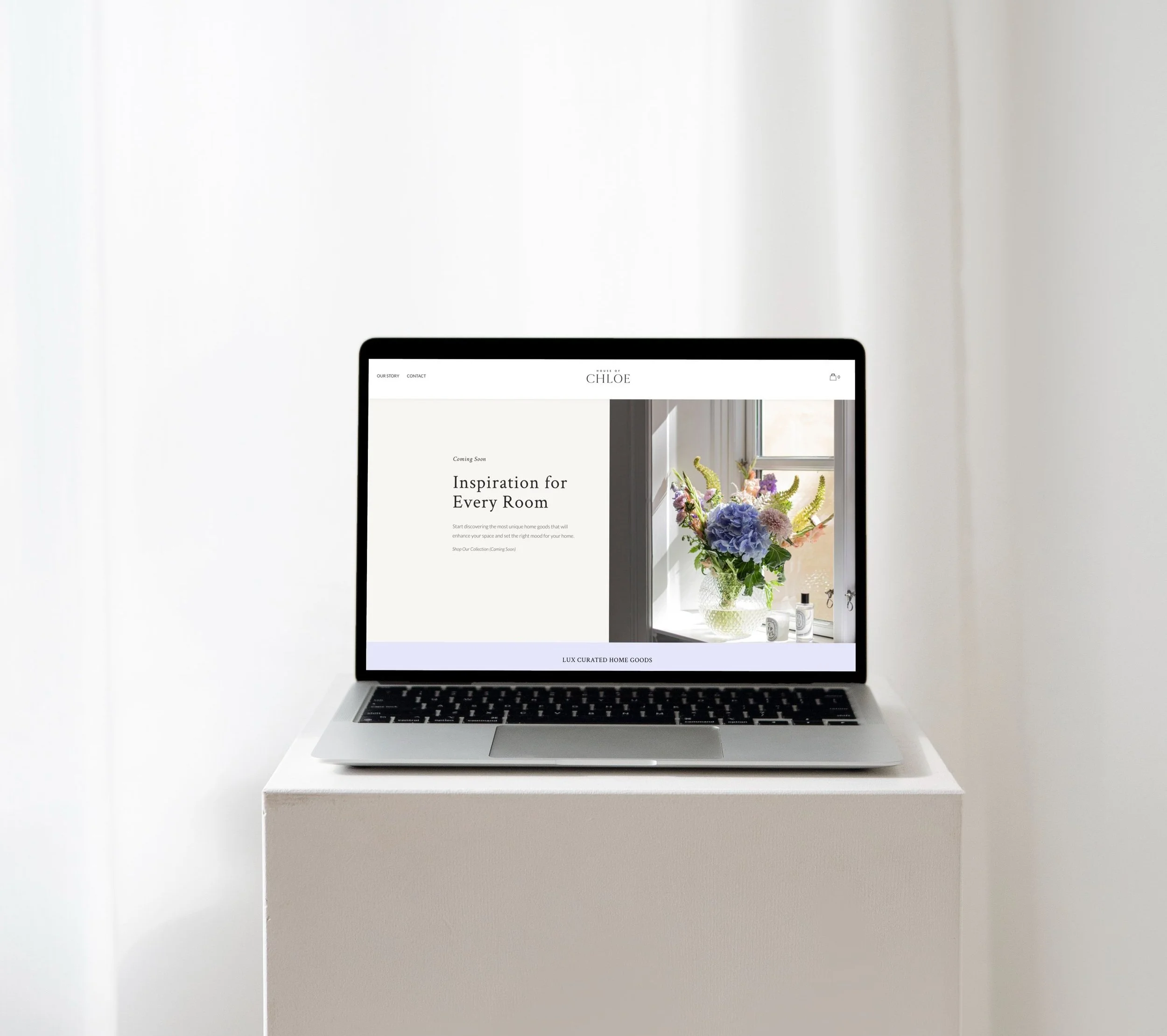 mockuuups-macbook-mockup-on-a-white-table-in-an-all-white-background02.jpg