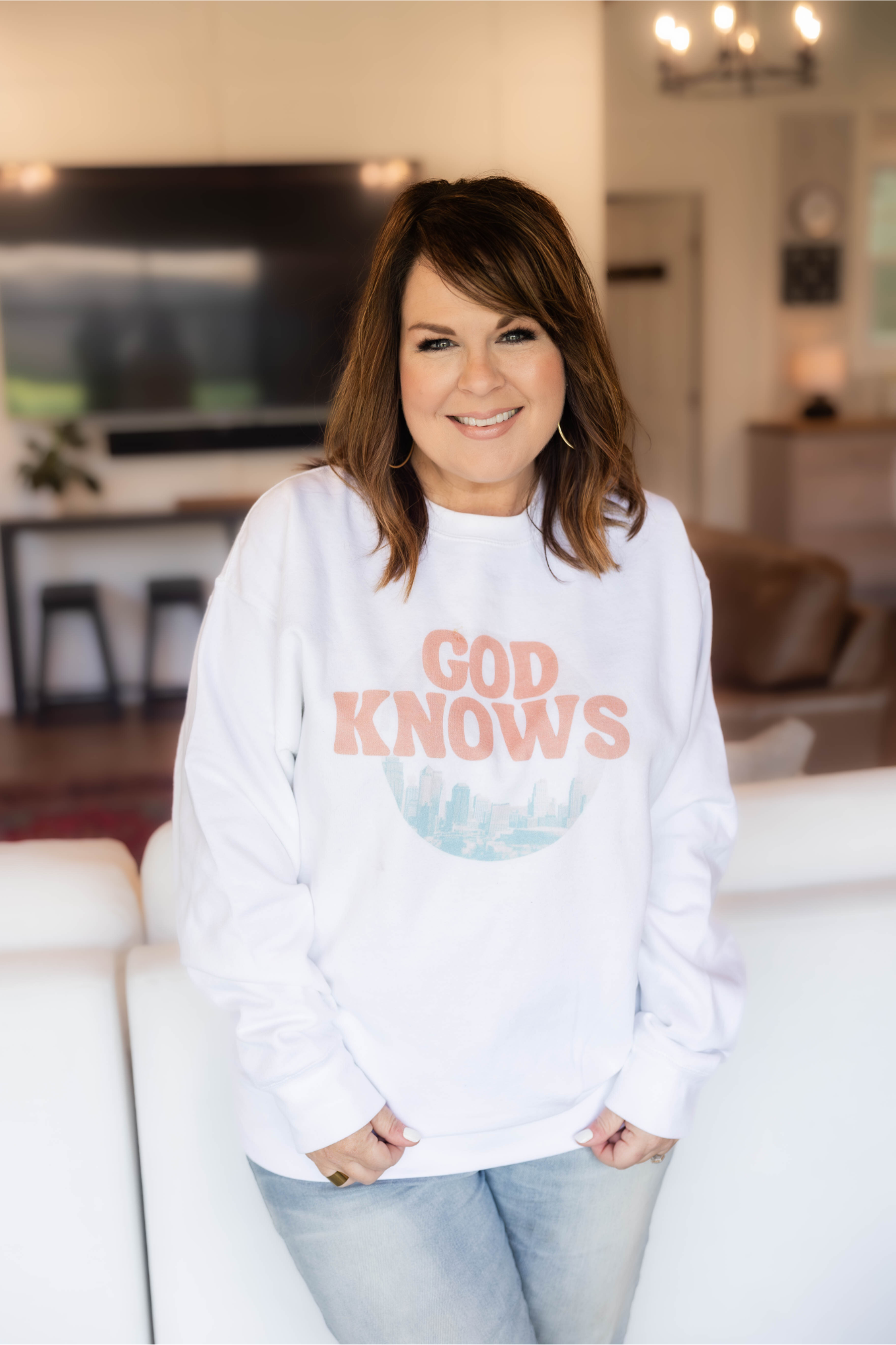 Lisa Whittle in God Knows Sweatshirt