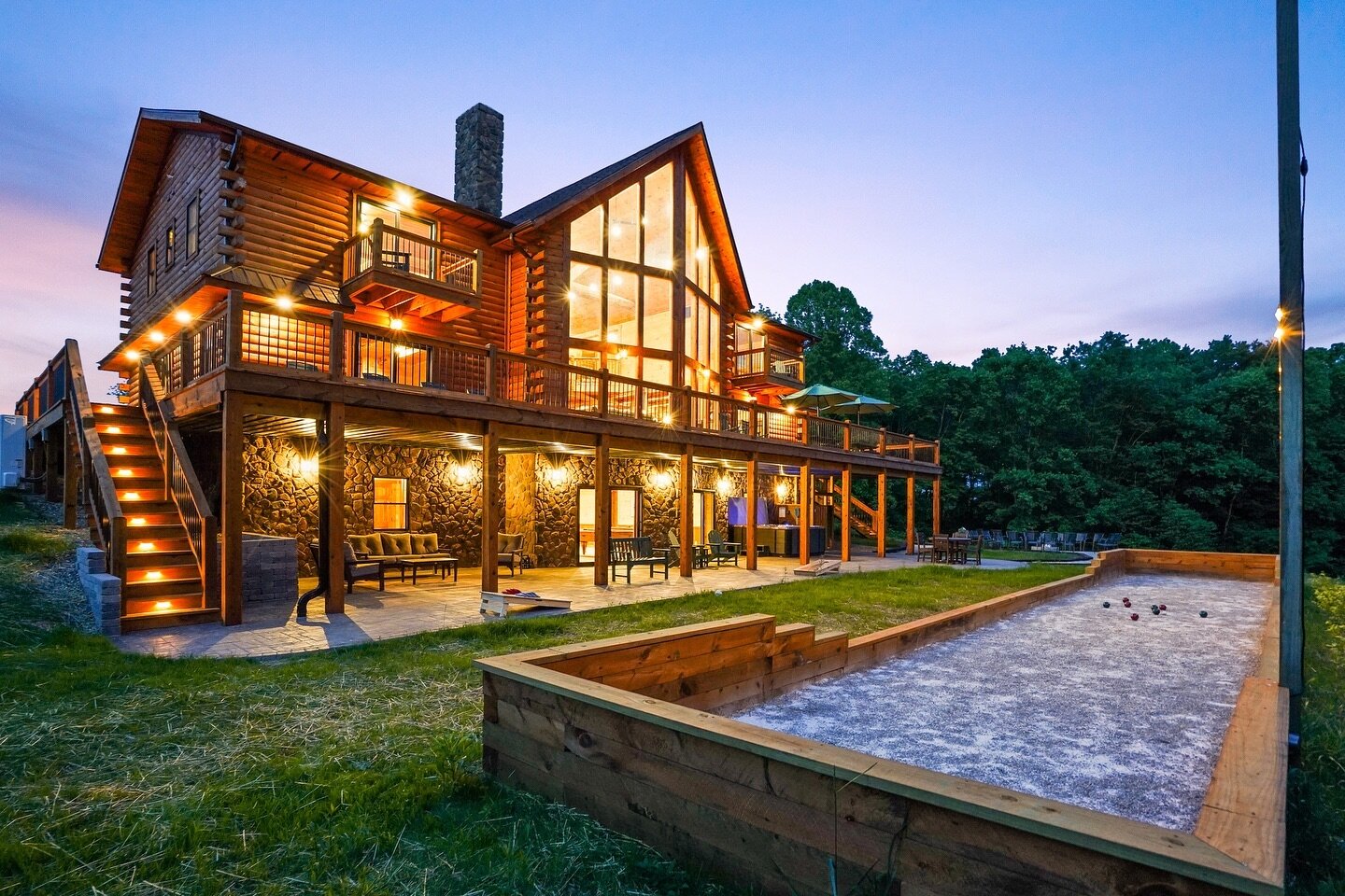 Golden Acres Lodge really shines after dark ✨ 

#hockinghills #loghome #vacationrental #str #vrbo #superhost #bocceballcourt #cabin #cabincrew #ohio #ohiocabins