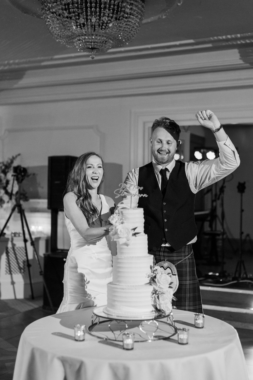 Cake cutting captured by wedding photographer