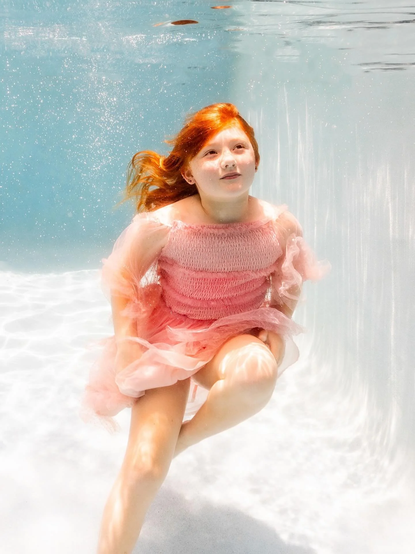 There&rsquo;s something incredible about kids underwater - kids are fearless, free, and totally themselves. No forced smiles. Just floaty fun, joyful moments, and twirly dresses that look like jellyfish.
These aren&rsquo;t your typical portraits. The