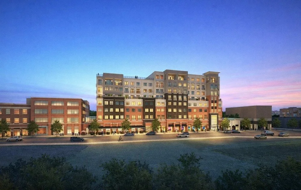 A mixed-use residential and retail building exterior, a fire protection project by More Group Fire Protection
