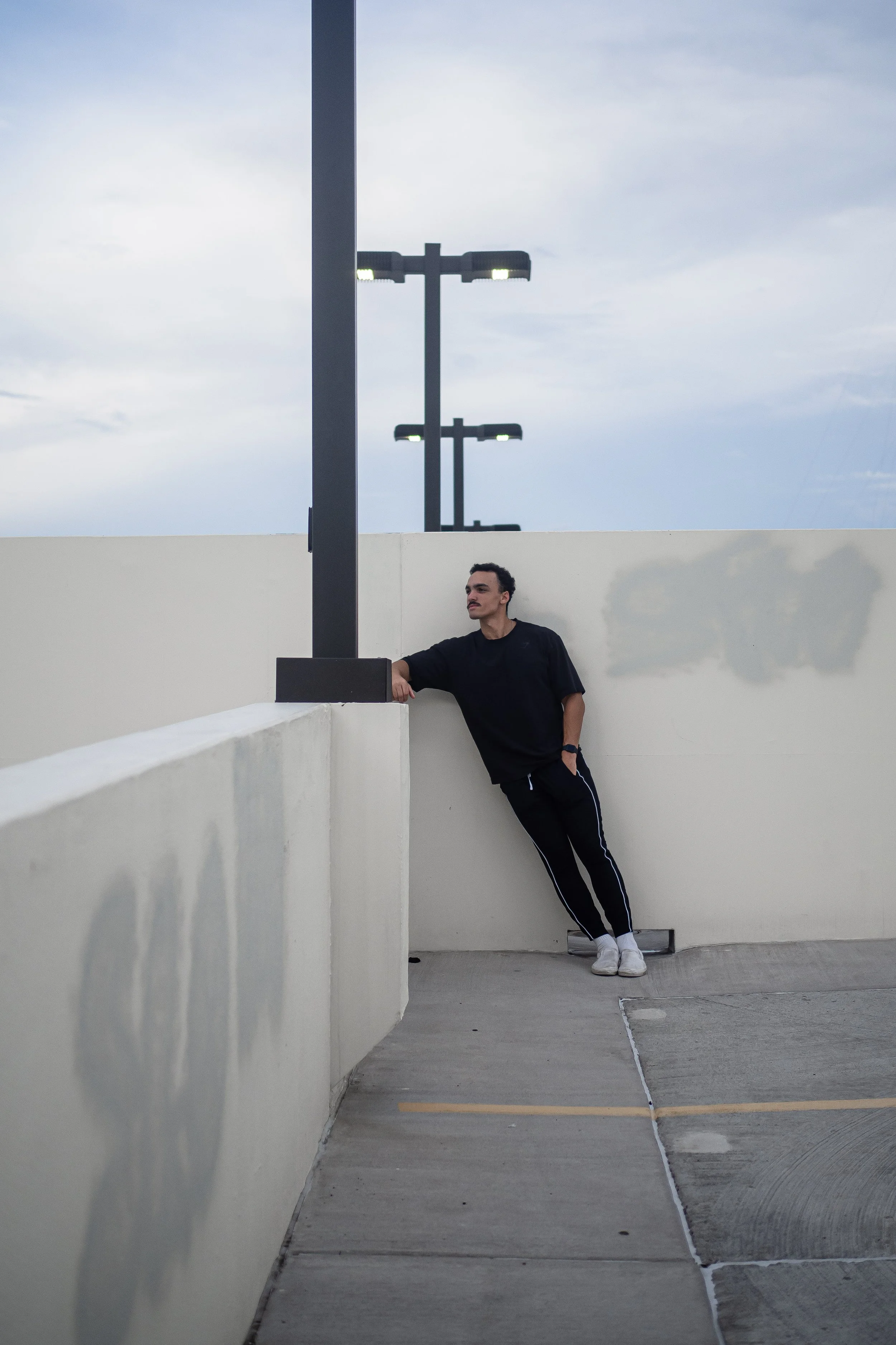 man in parking garage photoshoot
