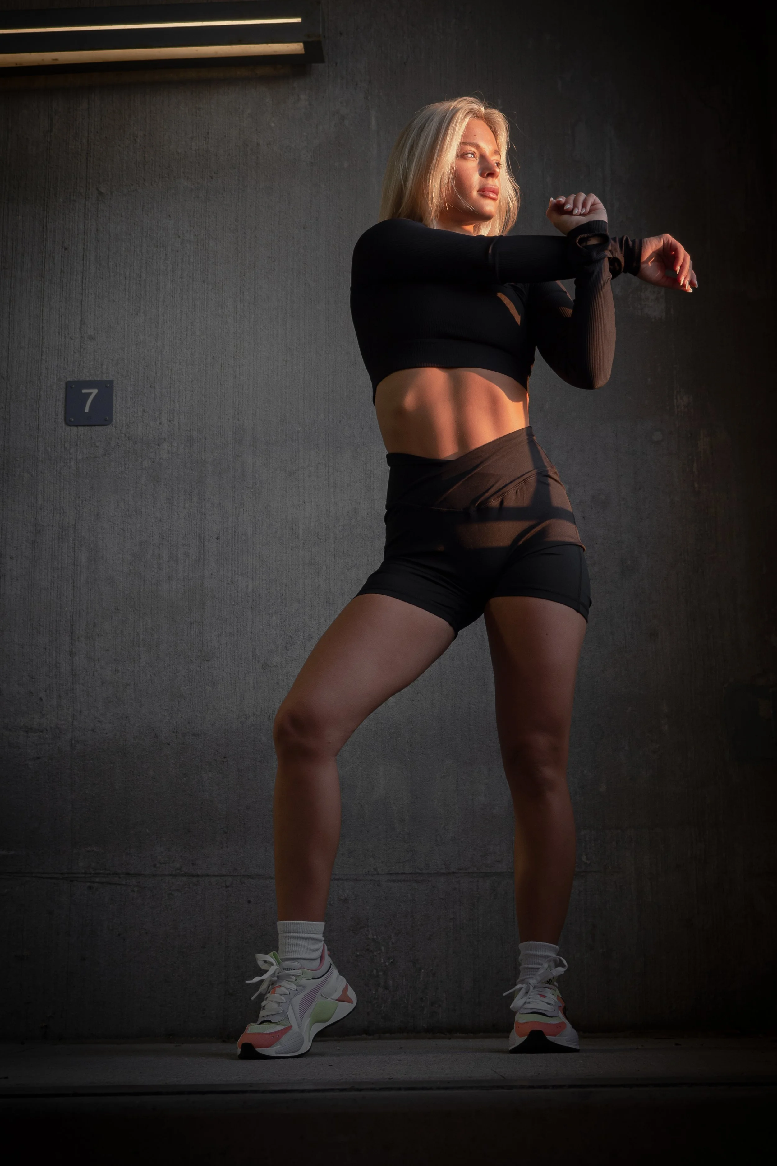 fitness women in parking garage photoshoot