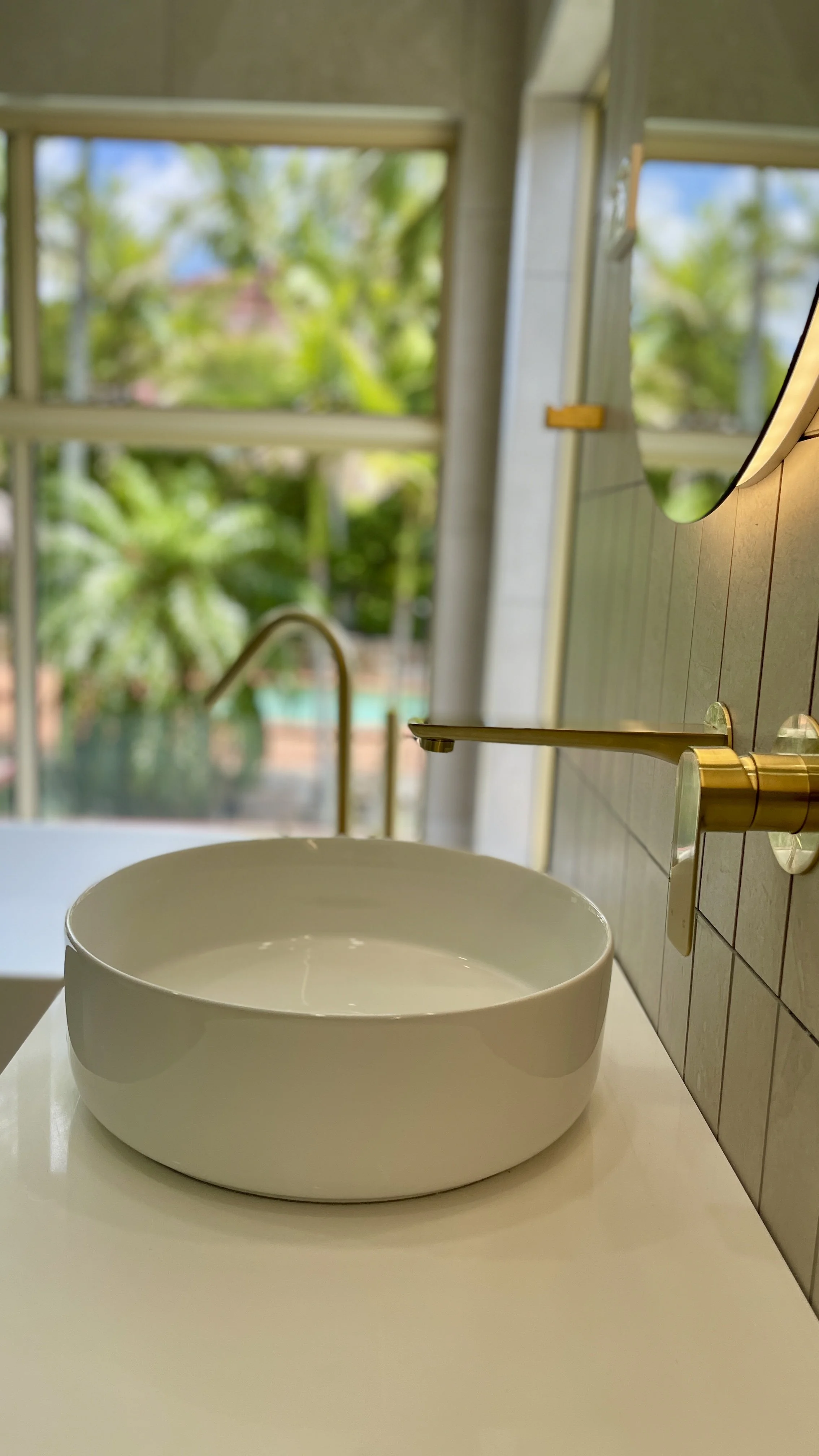 Shailer Park, Logan area, Southside of Brisbane bathroom renovation. Beautiful modern bathroom, white basin, timber ribbed vanity, white ribbed bath tub. 