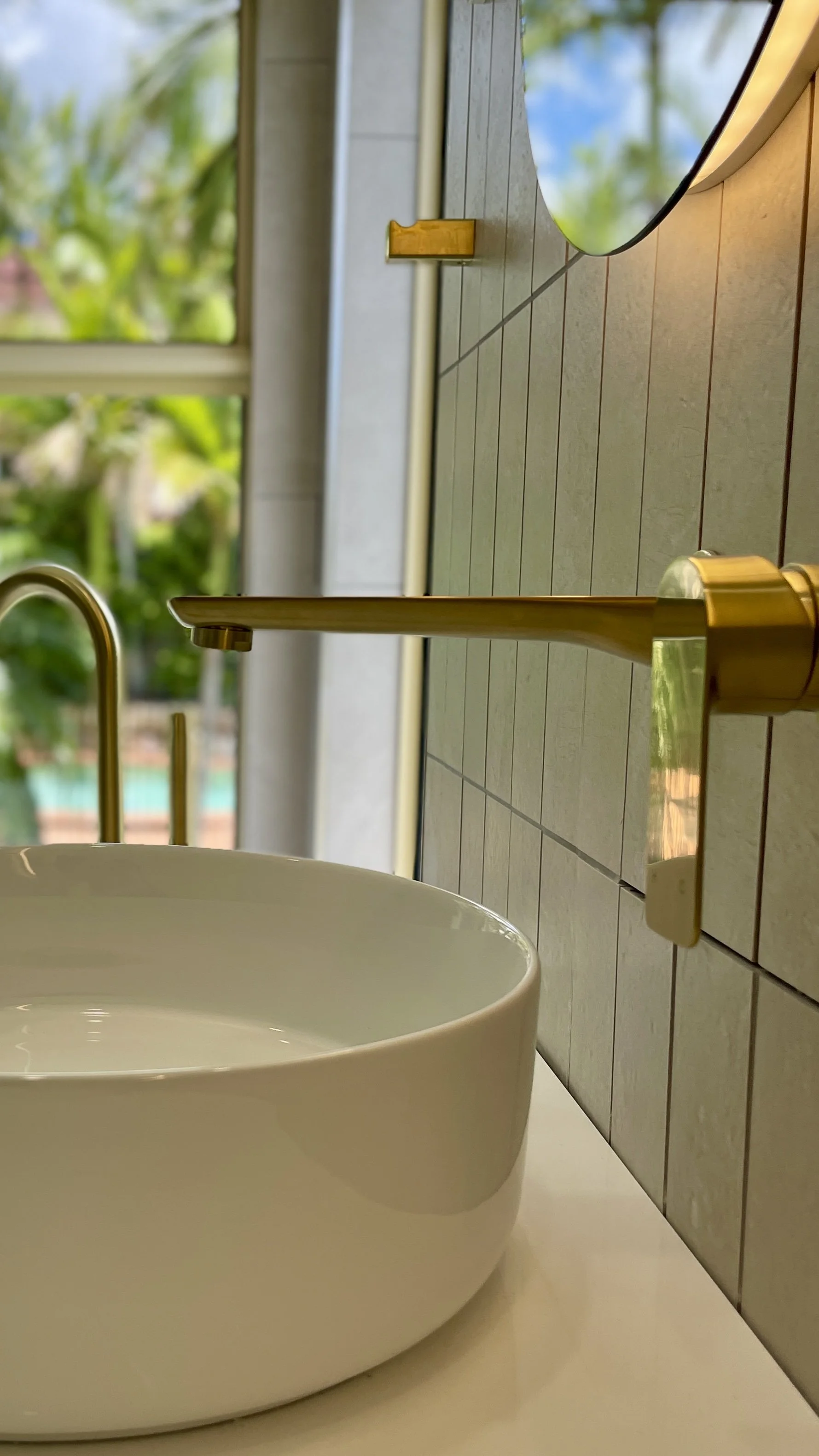 Shailer Park, Logan area, Southside of Brisbane bathroom renovation. Beautiful modern bathroom, white basin, timber ribbed vanity, white ribbed bath tub. 