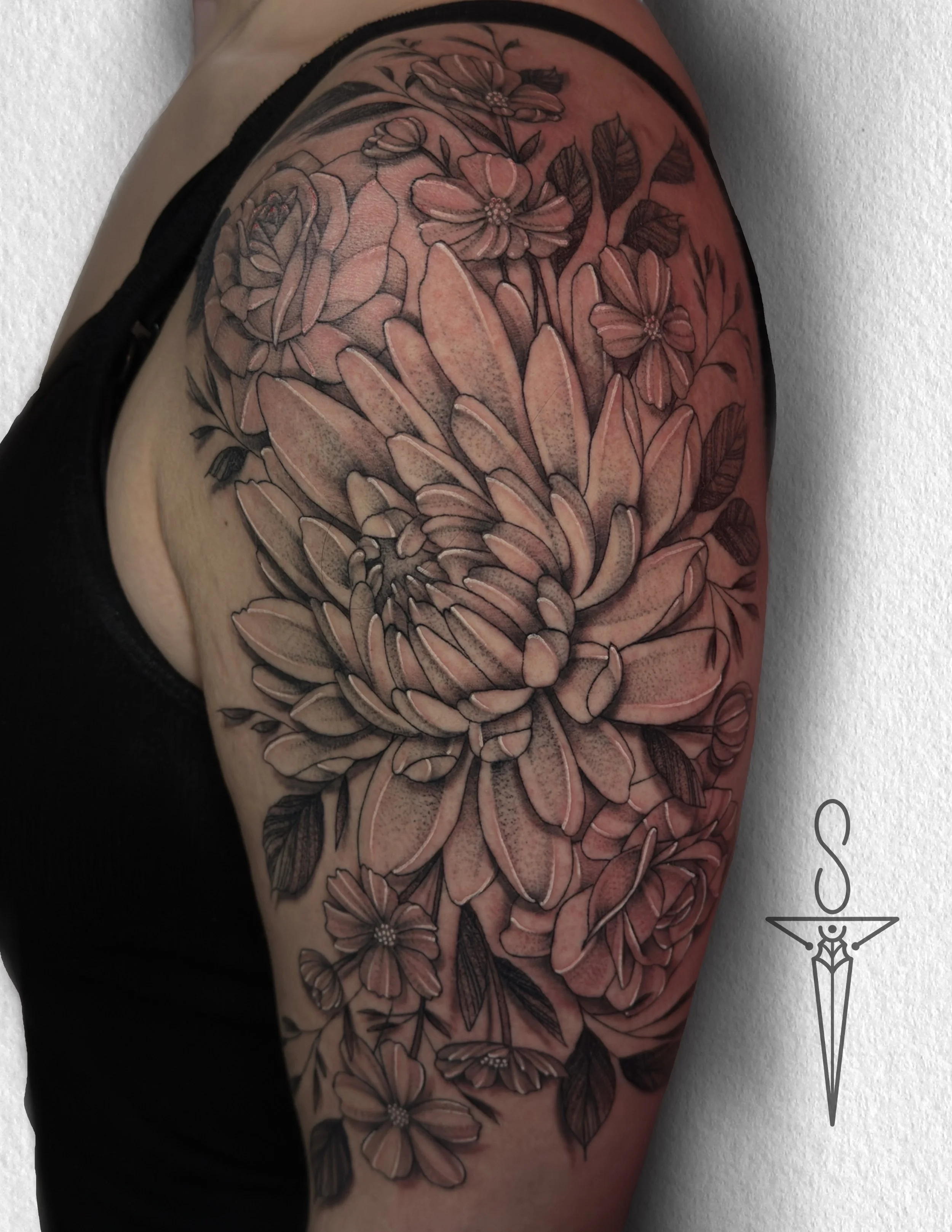 stipple-flowers-arm-tattoo-rockford-il