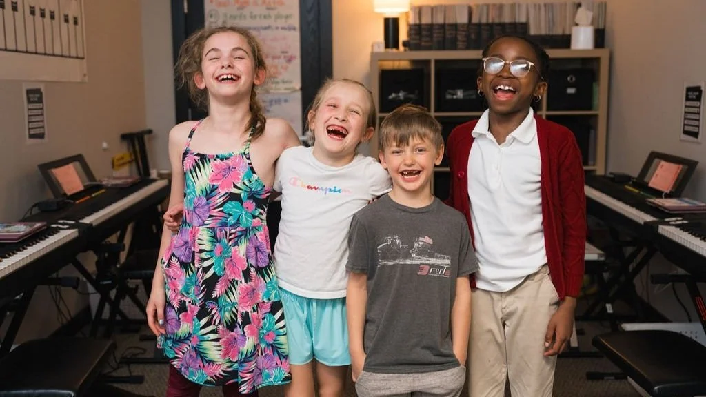 piano class students laughing