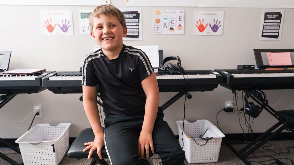 boy student at piano
