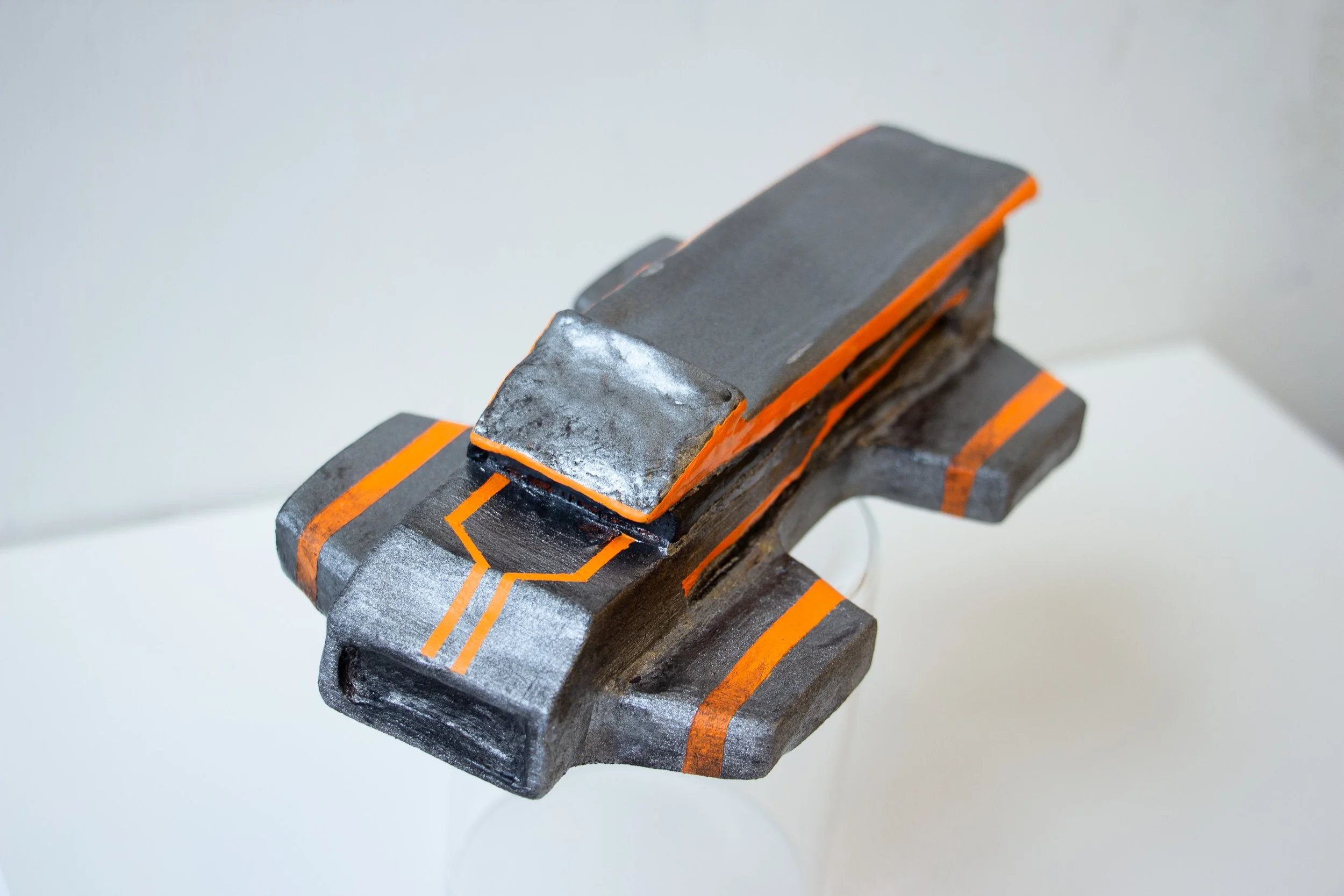 "JPNY" (2022), Air-dry clay and acrylic, 2 1/8" x 8" x 4 1/4".