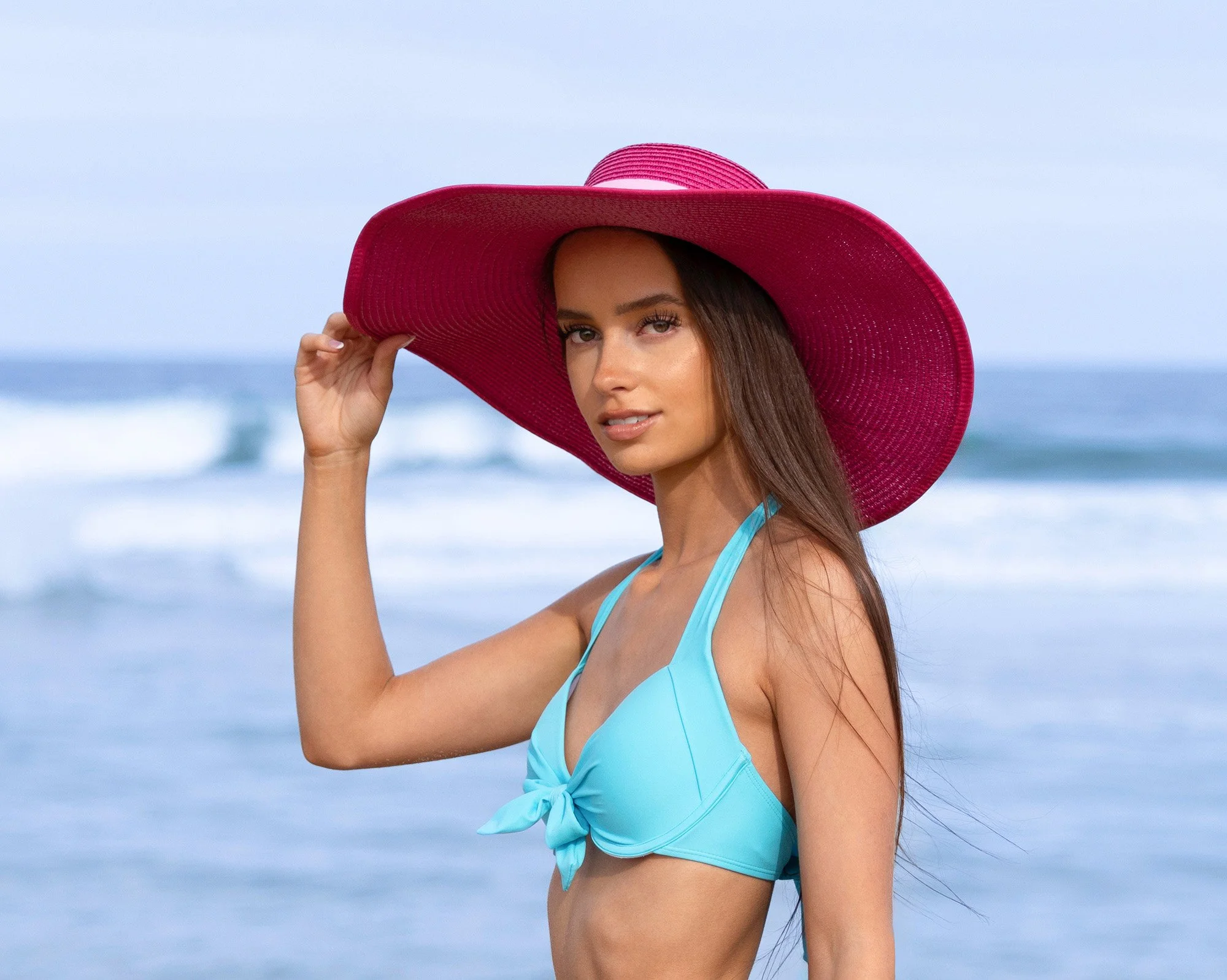 Turquoise Bikini paired with a Vibrant Pink Sun Hat