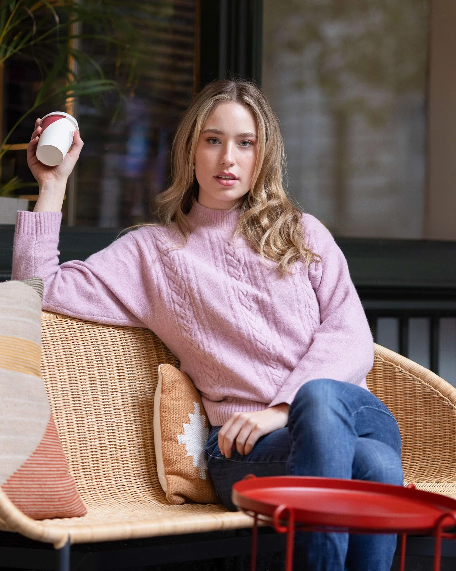 Female model photoshoot on location in Sydney CBD drinking coffee