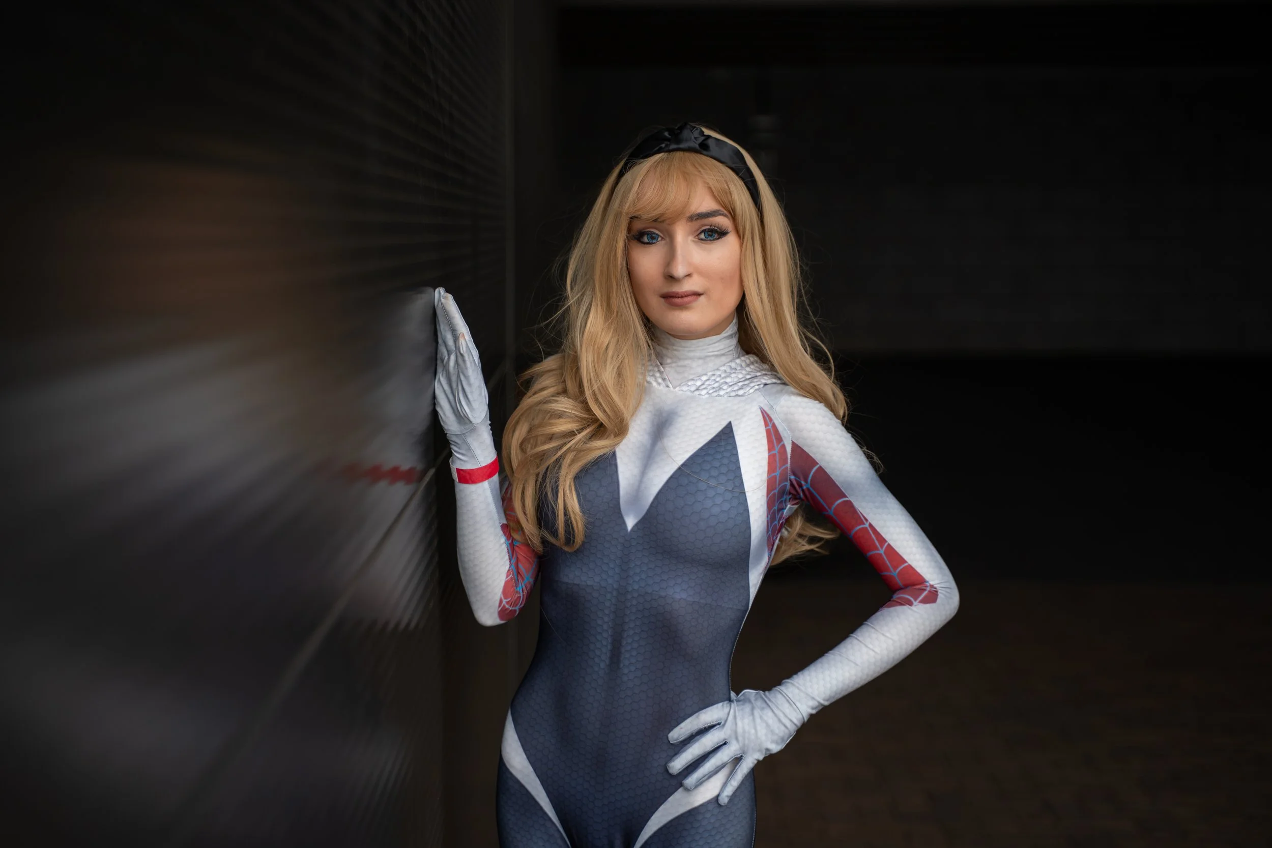 Spider-Gwen cosplayer posing at Titan Wales Comic Con