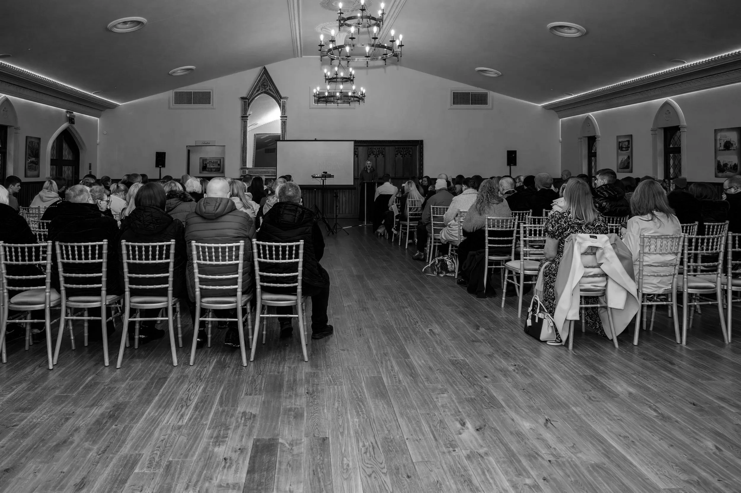 Black and white image of a memorial service