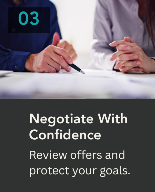 Home sellers reviewing an offer and negotiation terms