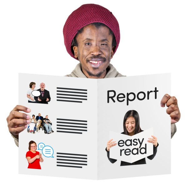 A person holding up an easy read report, with text and large images