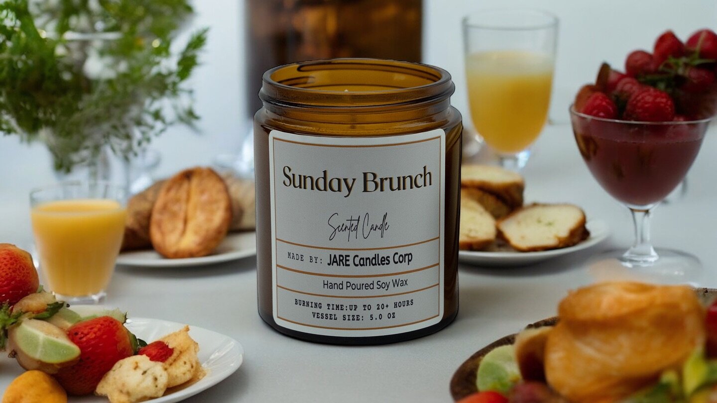 Inviting all senses to the table with our scented candle &ldquo;Sunday Brunch&rdquo;, in our new 5 oz Amber vessel. Sunday Brunch is a hand-poured 100% soy wax candle, that embodies the essence of leisurely mornings and delectable feasts. This 5 oz c