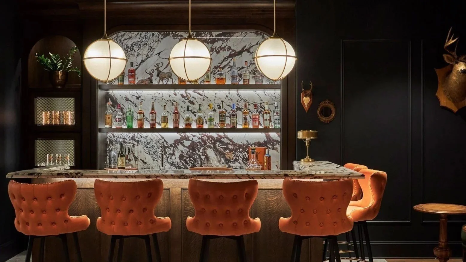 Modern, sleek bar with stone surround