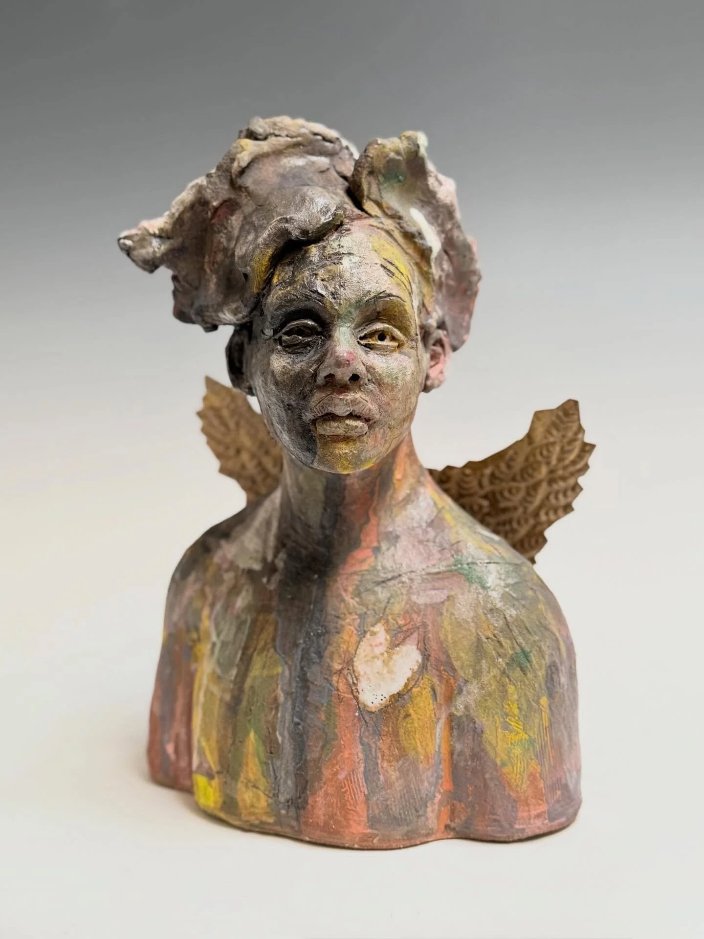 &ldquo;The Messenger&rdquo; Clay, glazes,metal. 10&rdquo;hx7&rdquo;wx4.5&rdquo;d #angels #messenger #nicolemerkenssculpture #nicolemerkensart #angelart