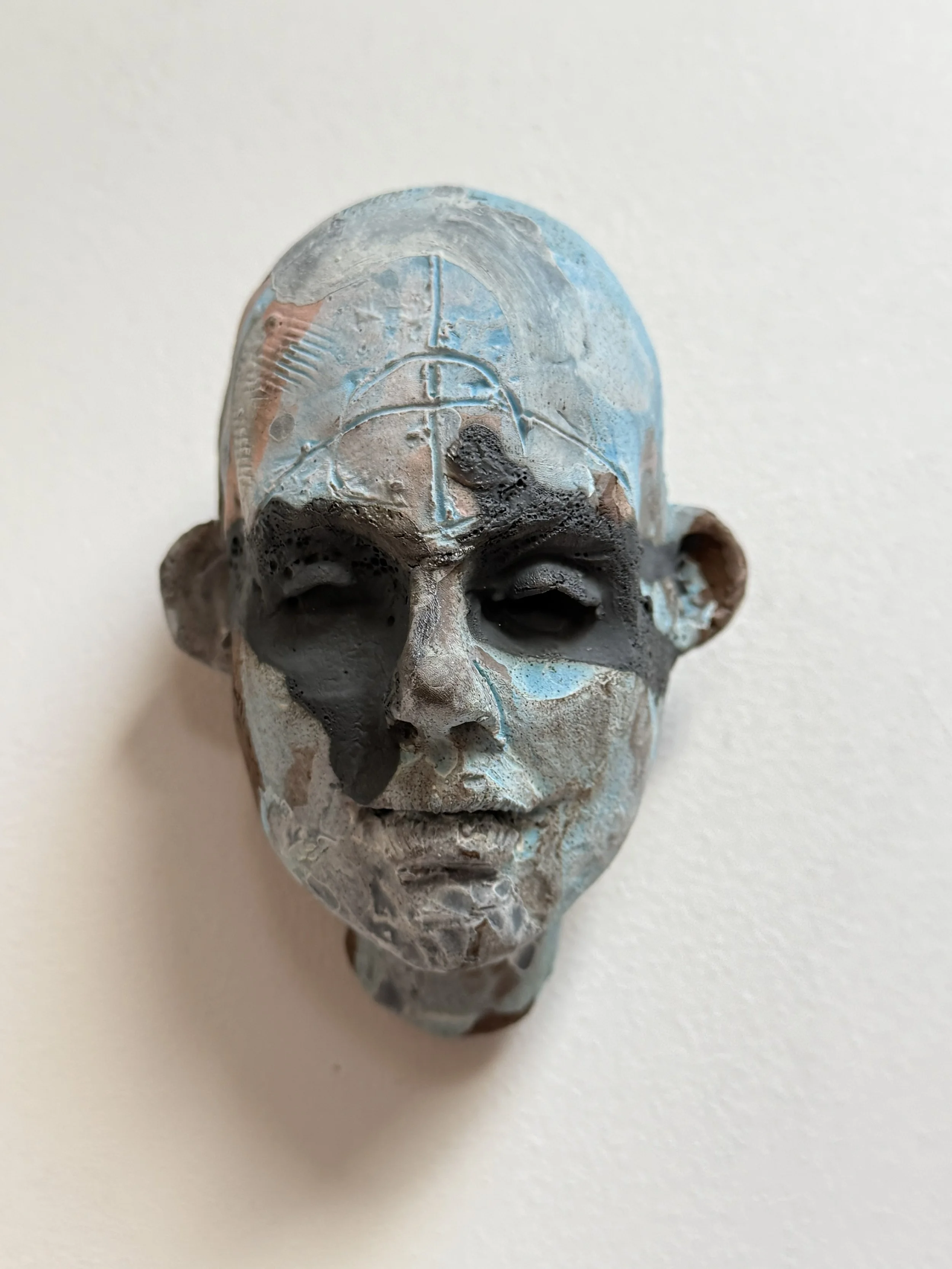 "Bandit" Wall Head 4”hx3”wx3.5”d . Clay 