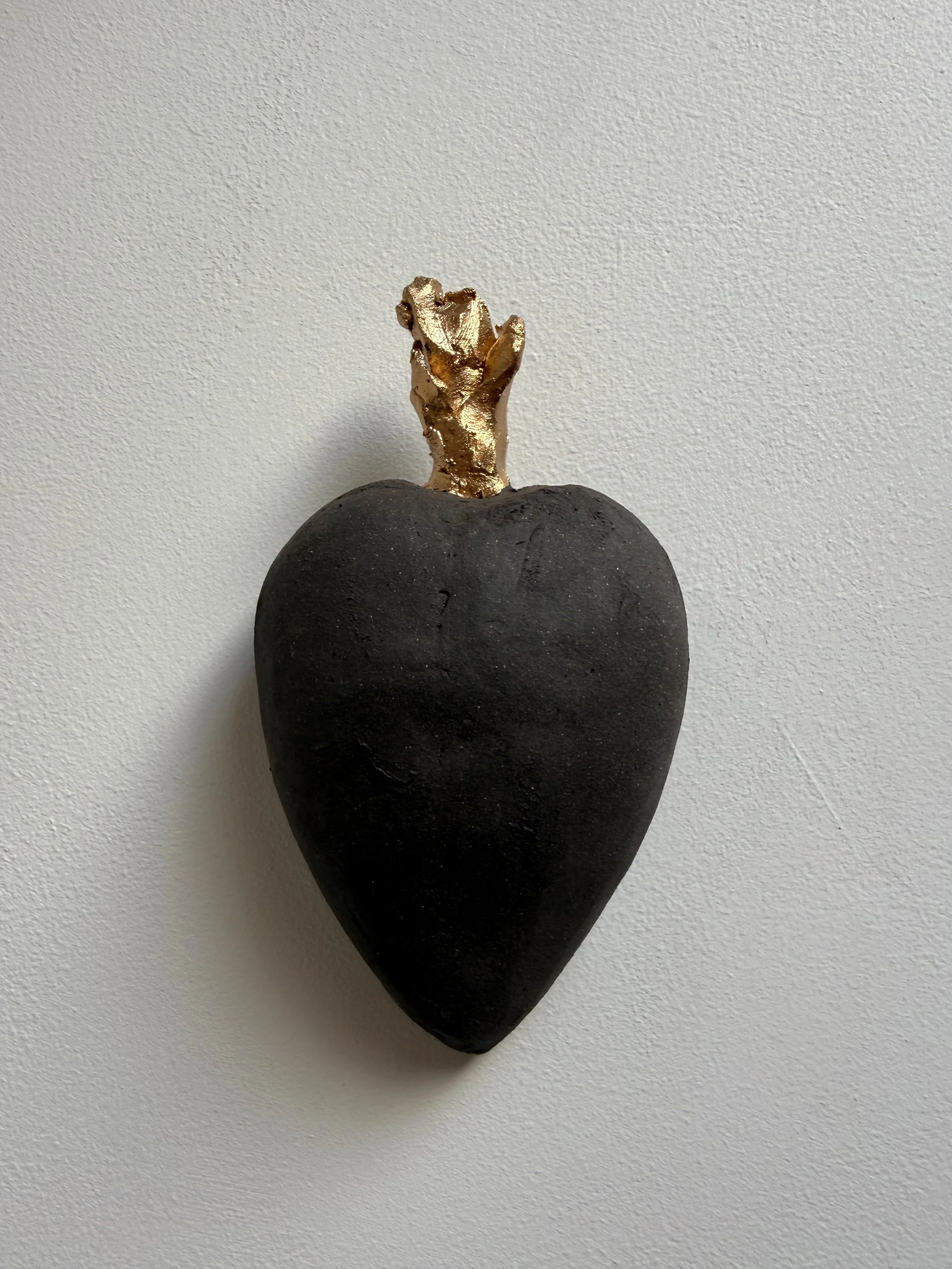 "Black Sacred Heats" 6.5"hx3.5"wx2"d