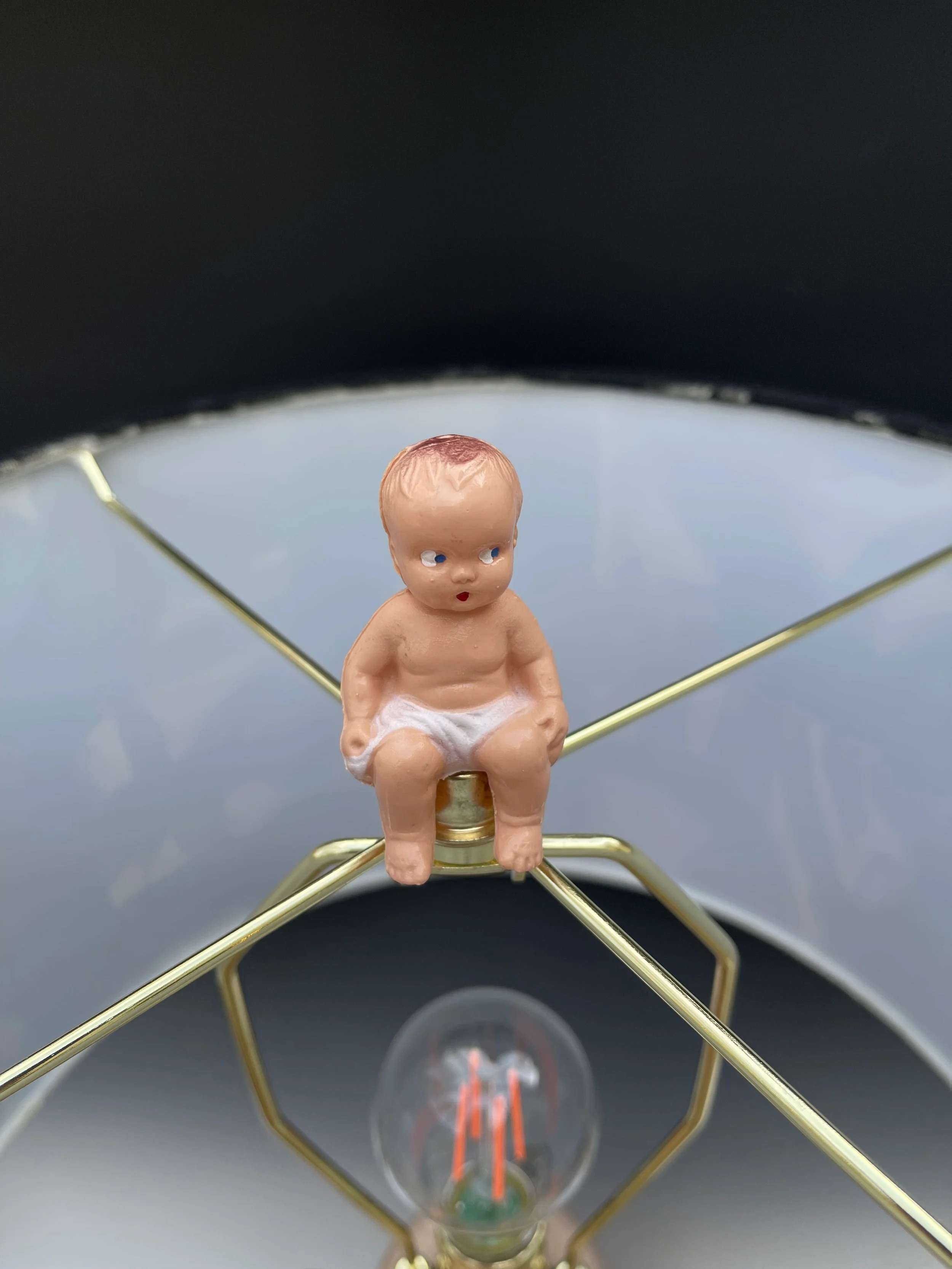 "Doll Lamp". 32” high to top of baby finial. 10”w x 6”d. Lampshade is 14.5” diameter