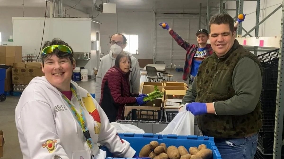 Ability Specialists clients sorting produce.