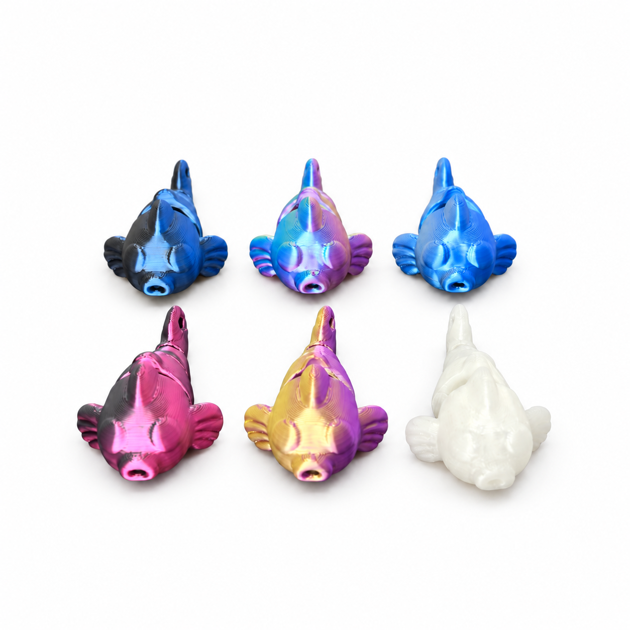 Six Iridescent Fish Figurines Grid.png