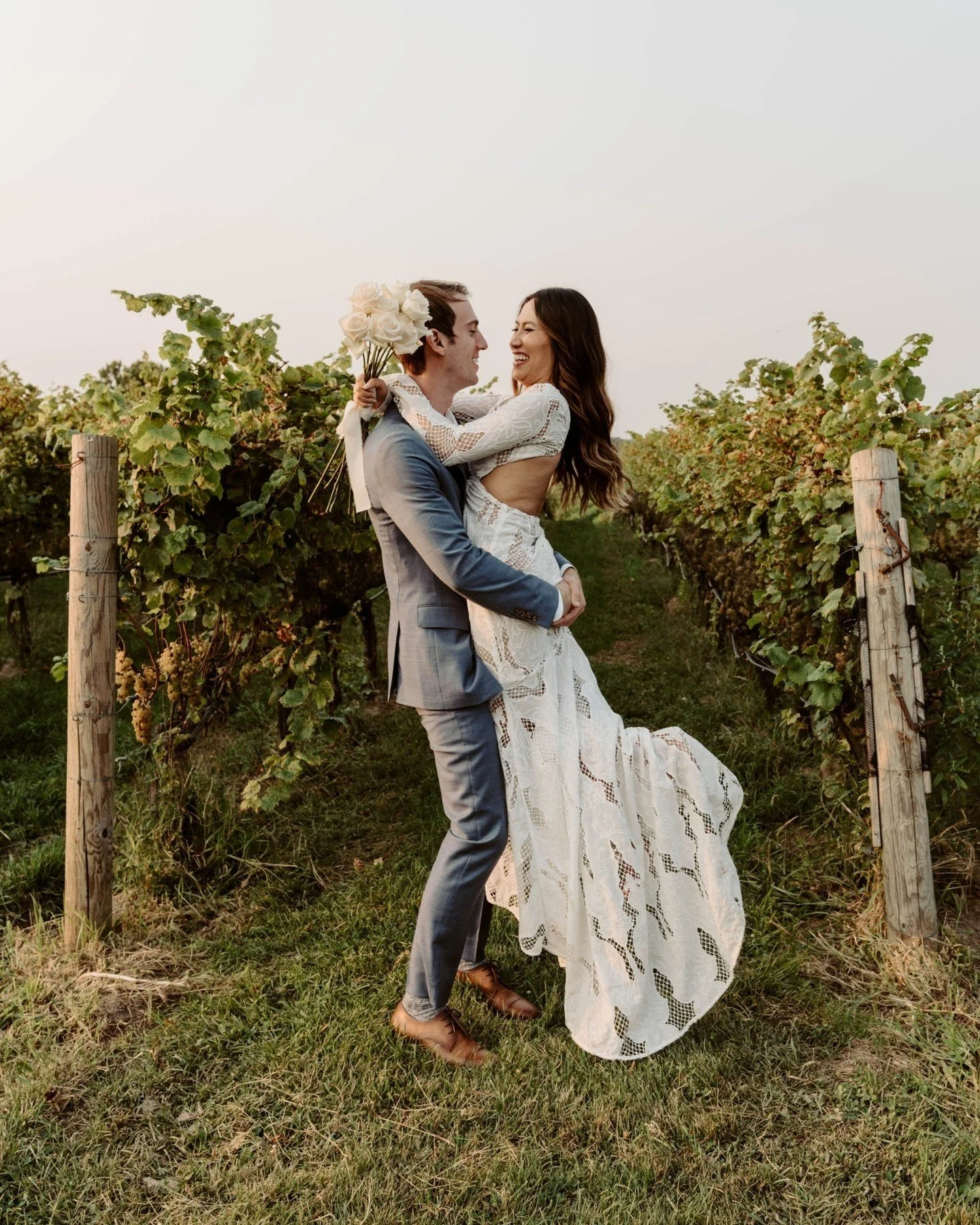 Thuy &amp; Bradley travelled up from Atlanta to have a gorgeous Niagara wedding at @ravinevineyard, set amongst the landscape, with a reception in the barrel cellar for that dramatic candlelight ambiance (scroll to see) 

Thuy comes from a creative b