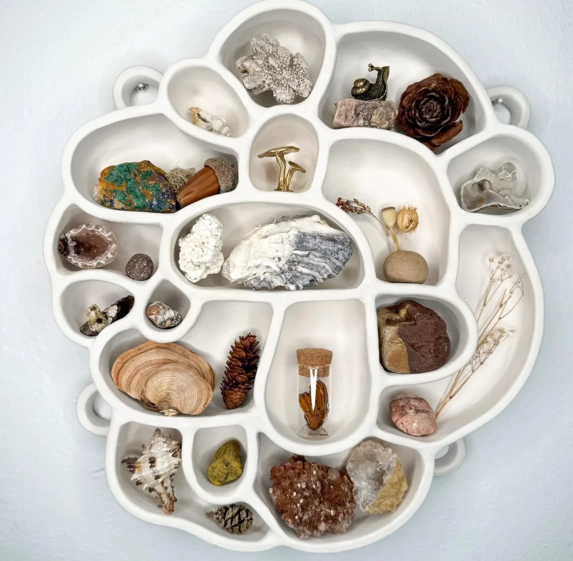 The Minimalist Ceramist: Handcrafted Shelves for Your Tiny Treasures