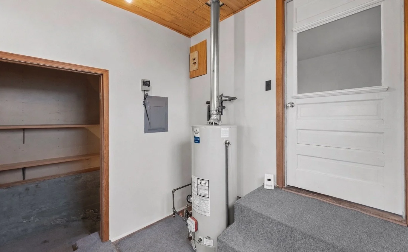 Back entry mud room and basement entrance.
