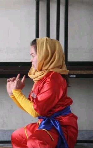 Attending wushu practice.