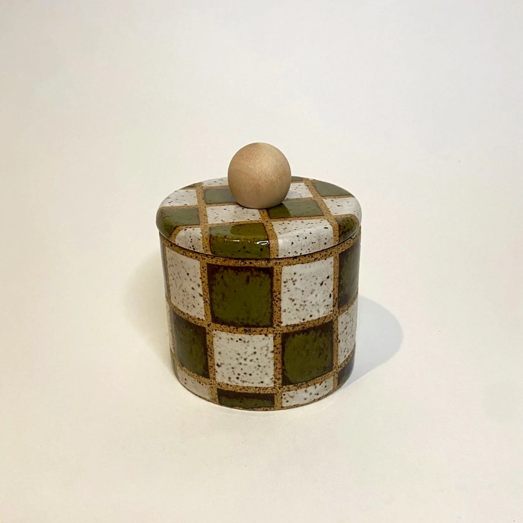 checkered lidded jar