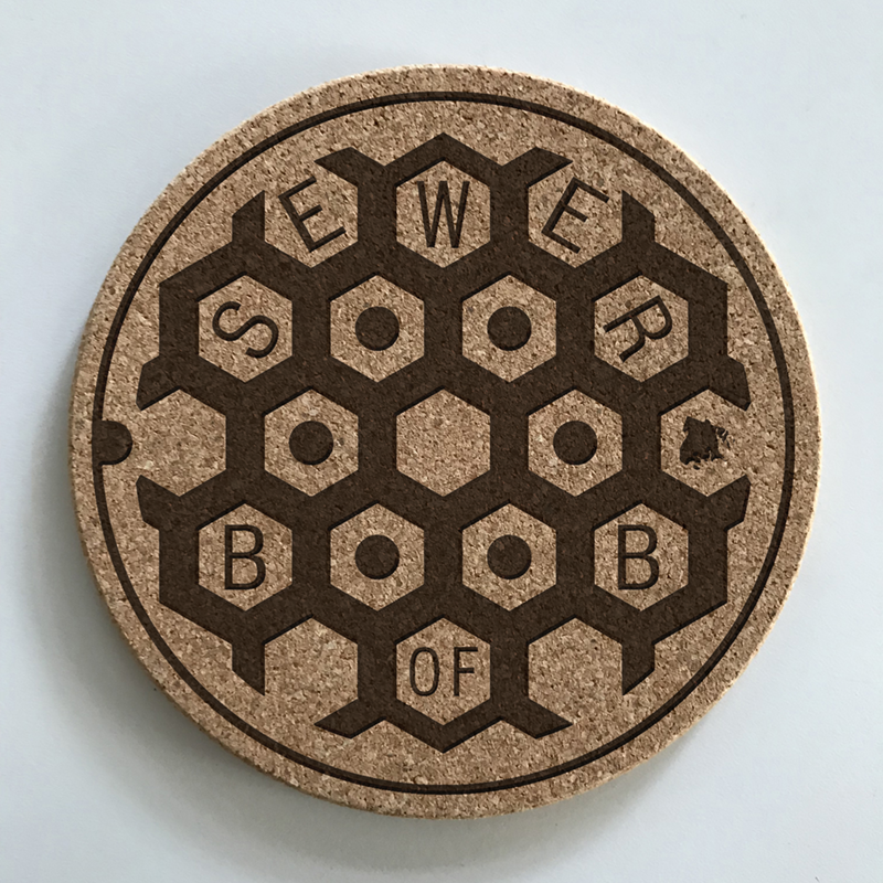 NYC: MANHOLE COVER DOZEN COASTER COLLECTOR SET — TOMBINO
