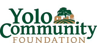 Yolo Community Foundation logo with green and brown text and a tree in the background.
