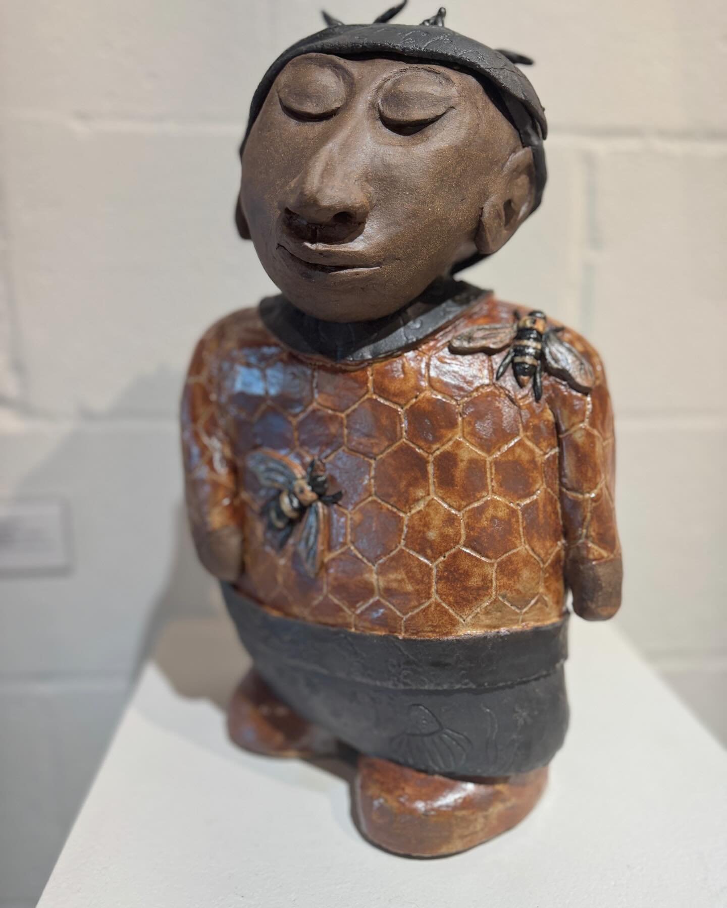 It&rsquo;s a bee-u-tiful day to stop by and visit our Women in Art, A Journey Exhibit!  Spotlight on Jacqueline Jackson&rsquo;s amazing work, &ldquo;Beekeeper&rdquo;, ceramic, 12x9in. 
Inspiration- While building our home a bees built a beehive in a 