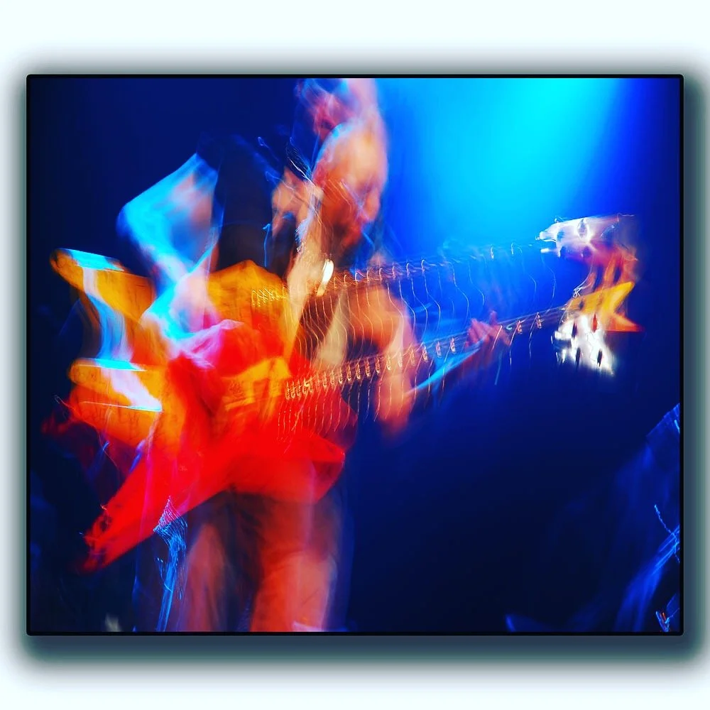 Guitar Rocker, Photography, 2012 — Plays multiple guitars at one time; blur on purpose