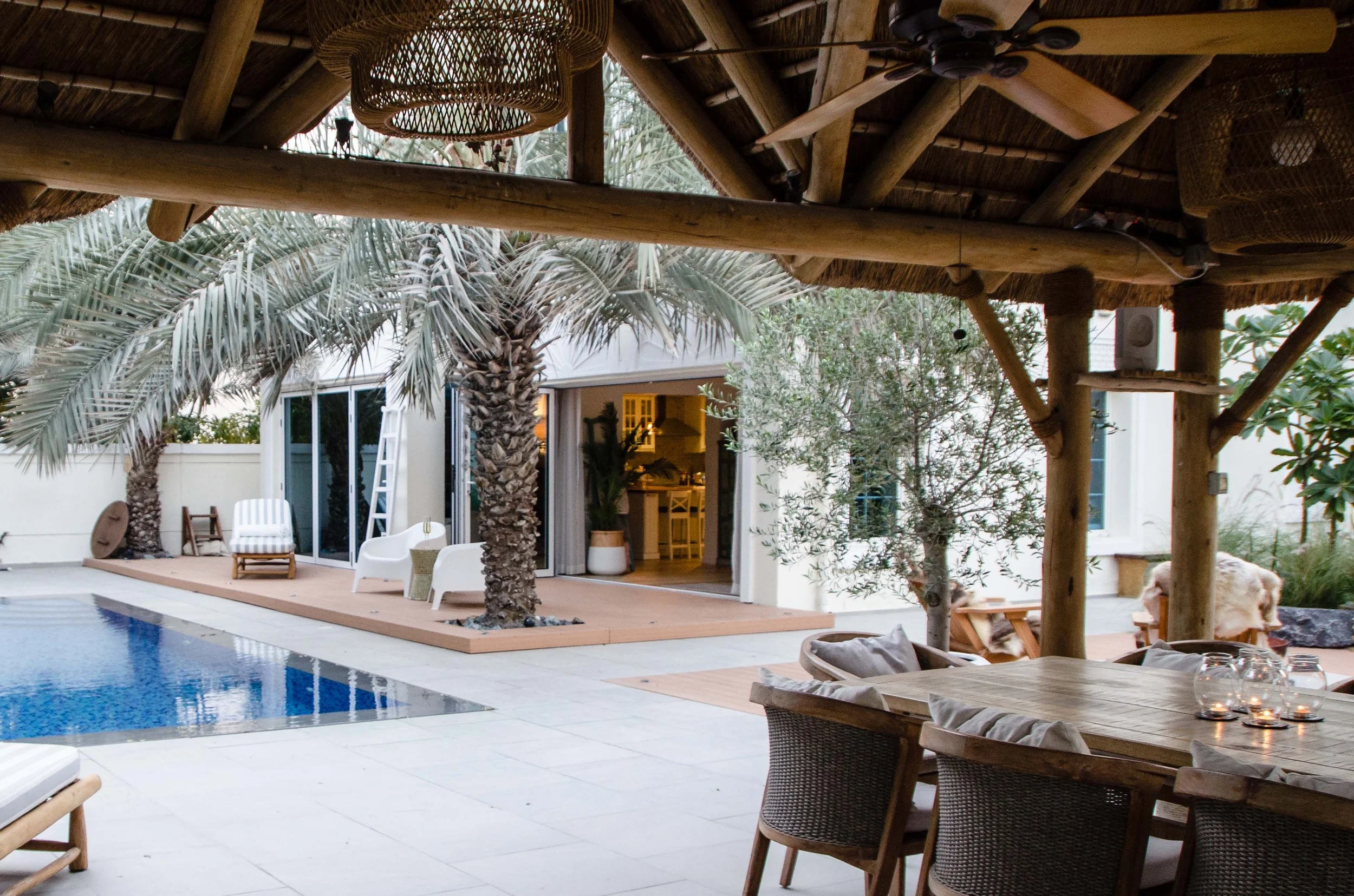 thoughtfully designed space blending relaxation and entertainment in a tropical - arid savanna vibe